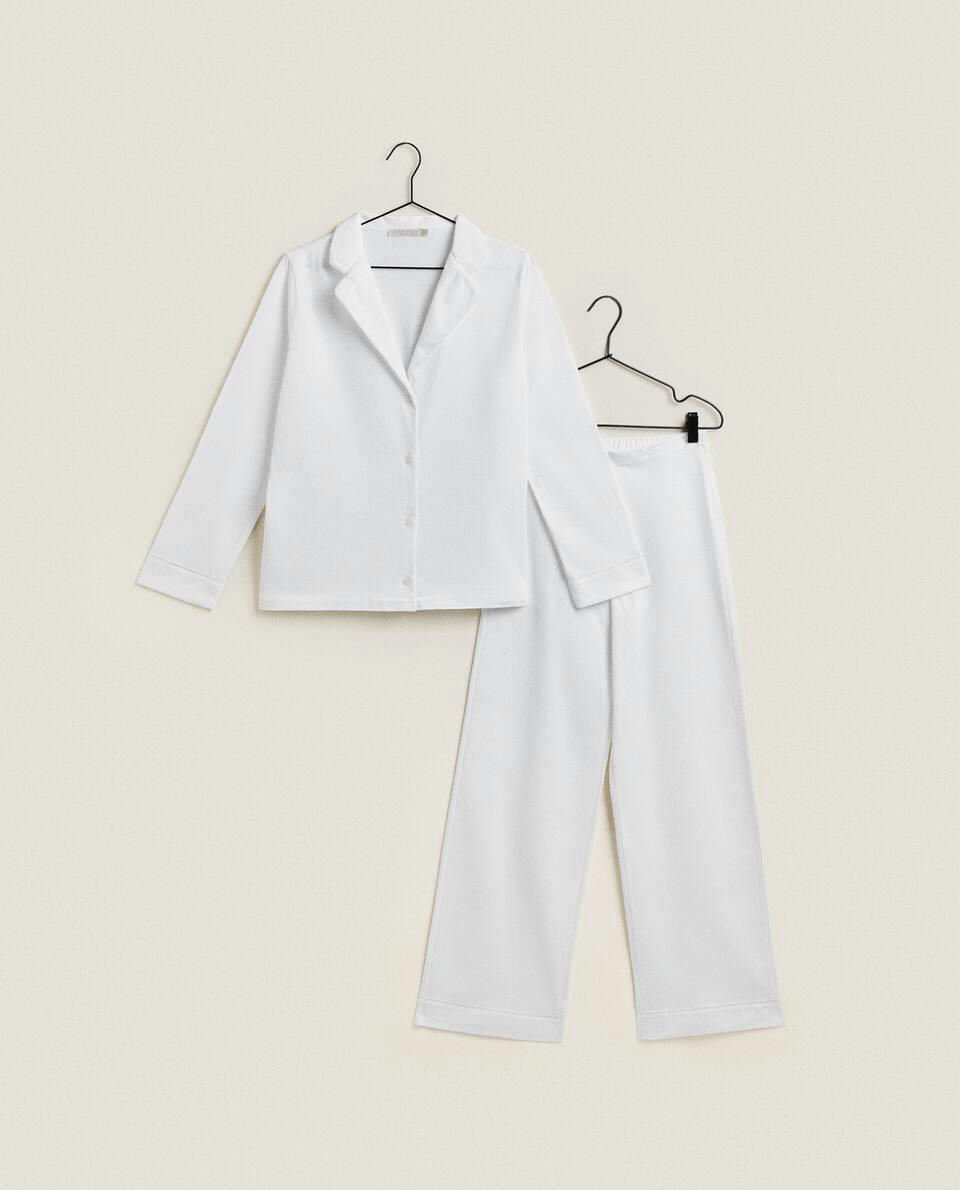 Camisa de algodão com detalhes em renda.