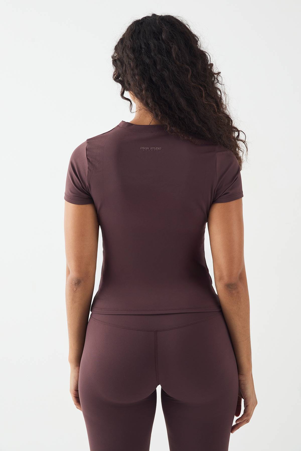 DSGN Studio Sports Top Ultra Sculptant à Manches Courtes