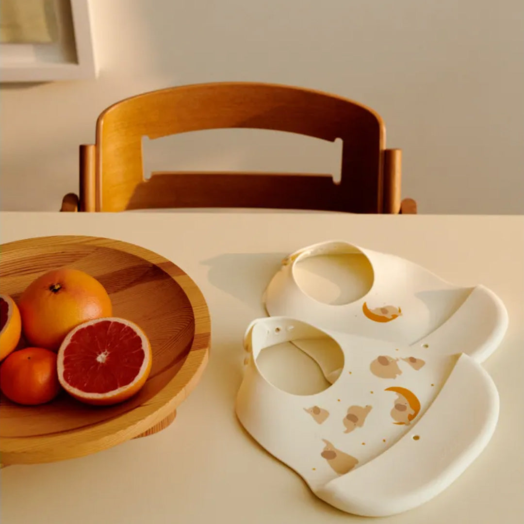 liewood siliconen slabbetjes ember - elephant - creme de la creme