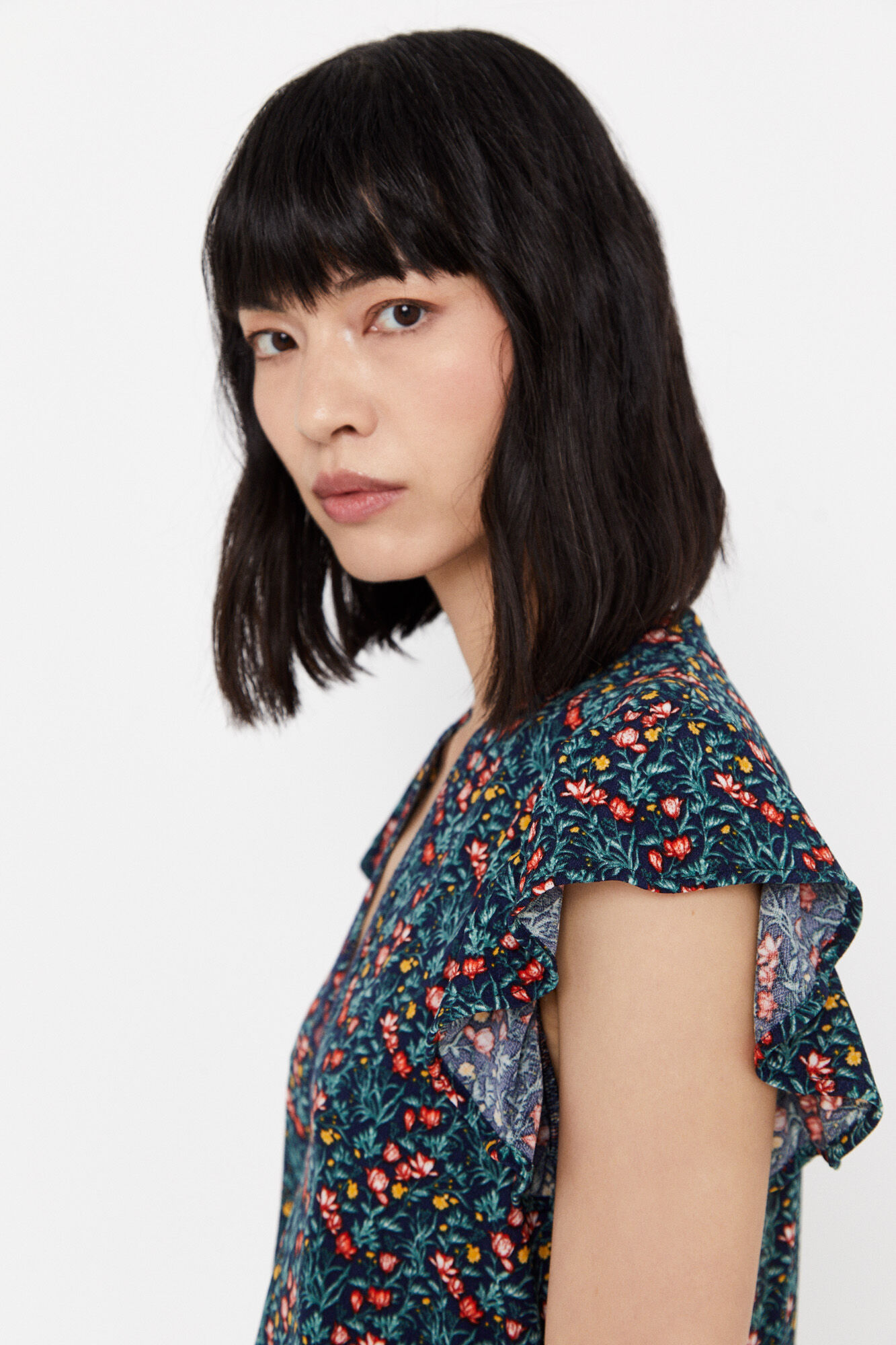 Blusa com babados e estampa azul