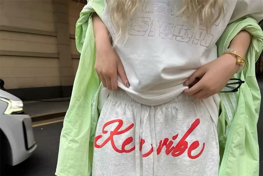 Femilina - Shorts met trekkoord en letters