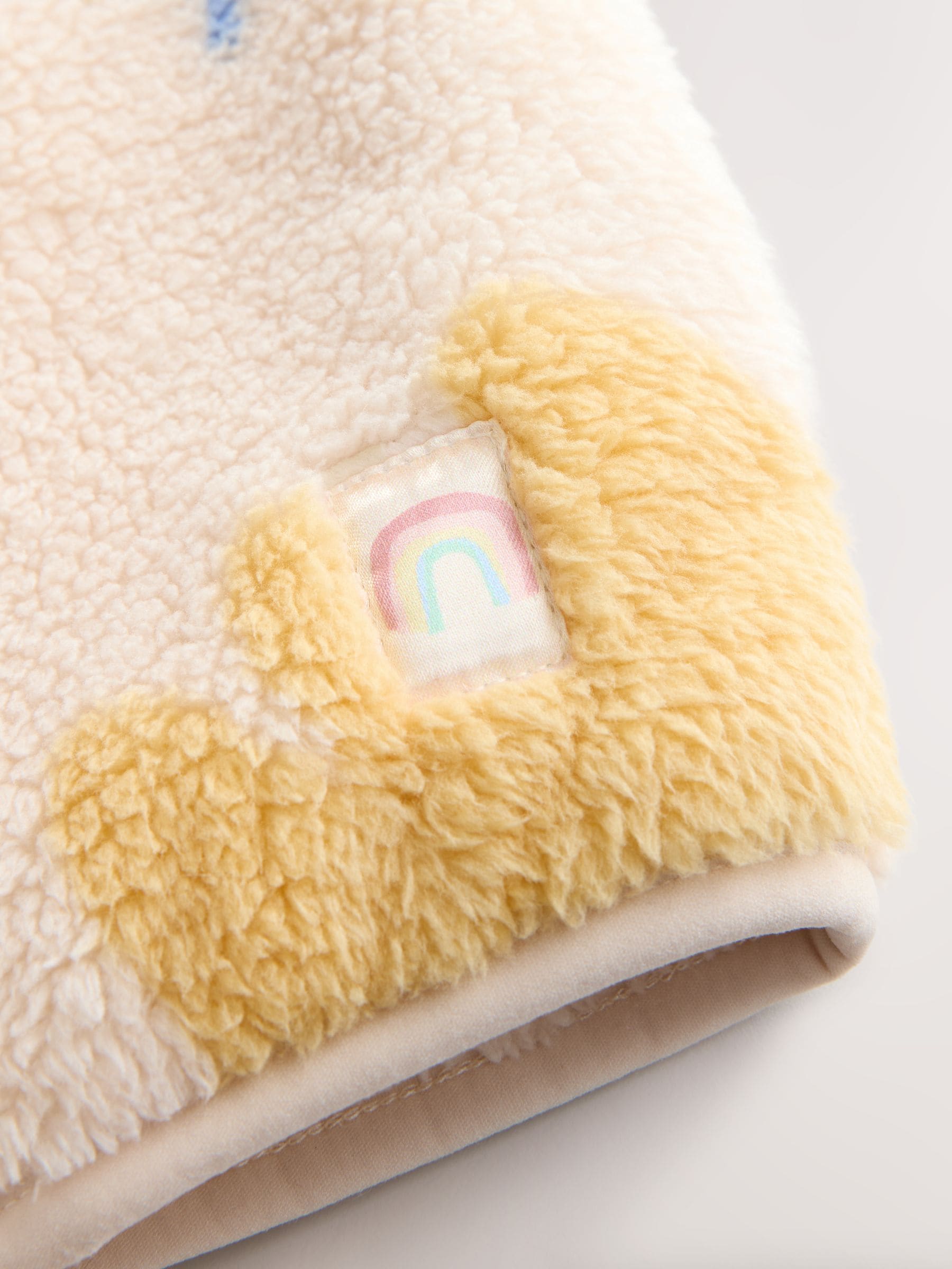 Crème tekeningetjes print - Fleece met ritssluiting (3mnd-7jr)