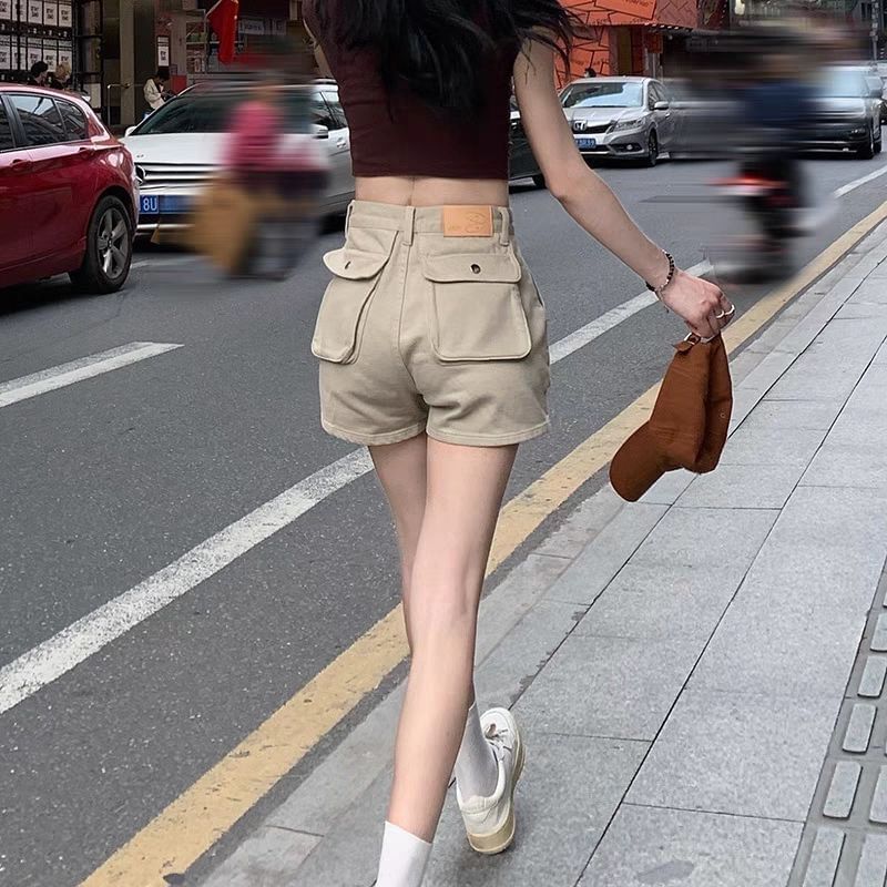 Coline - Hoge taille denim cargo shorts met wijde pijpen