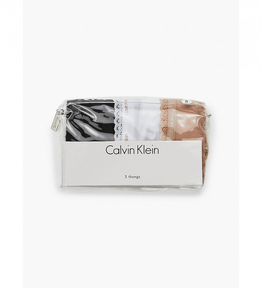 Conjunto de 3 calcinhas fio dental Calvin Klein Up: preta, branca e bege.