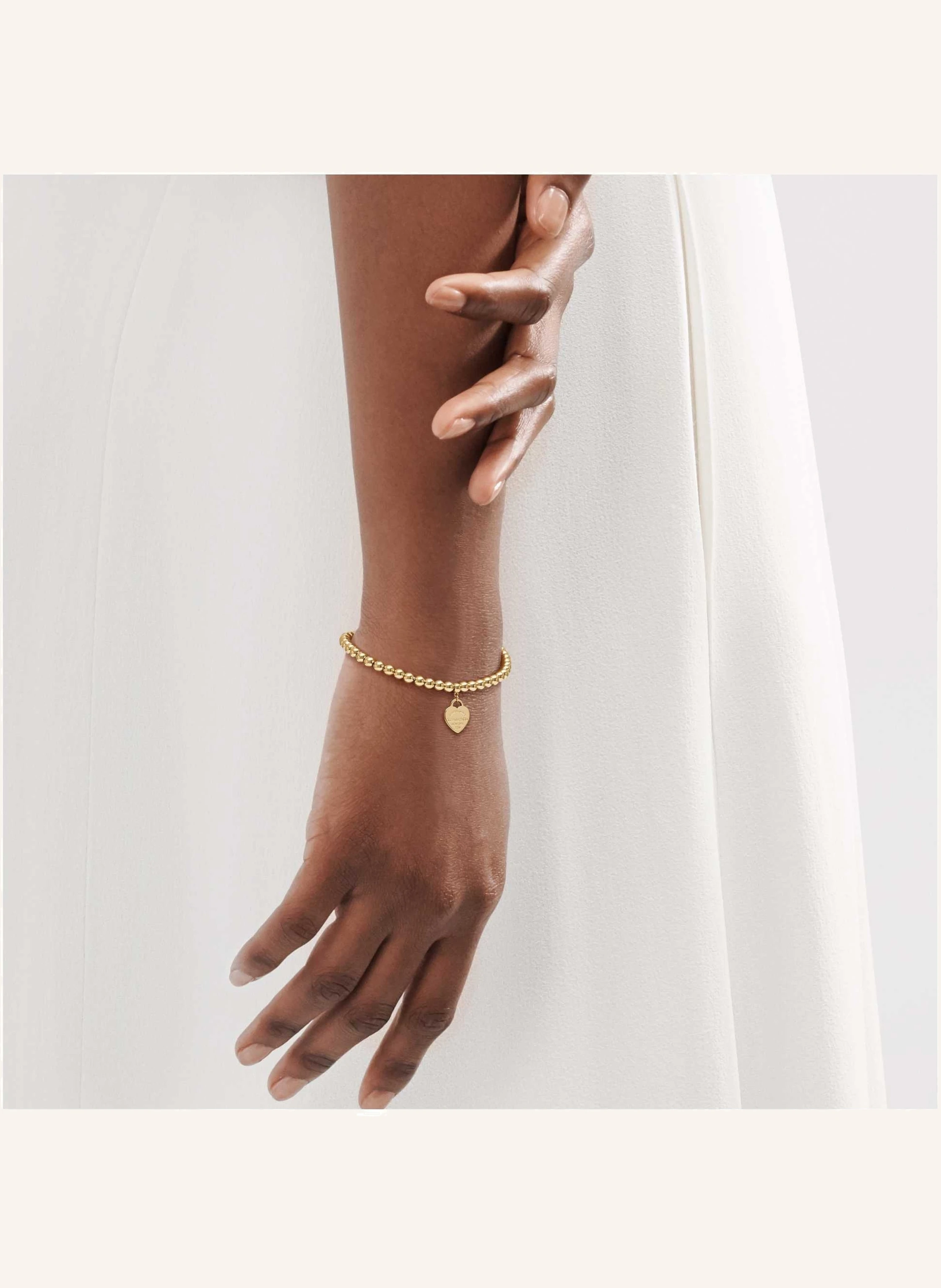 TIFFANY & Co. Return to Tiffany™ KUGELARMBAND MIT HERZANHÄNGER aus 18 Karat Gold
