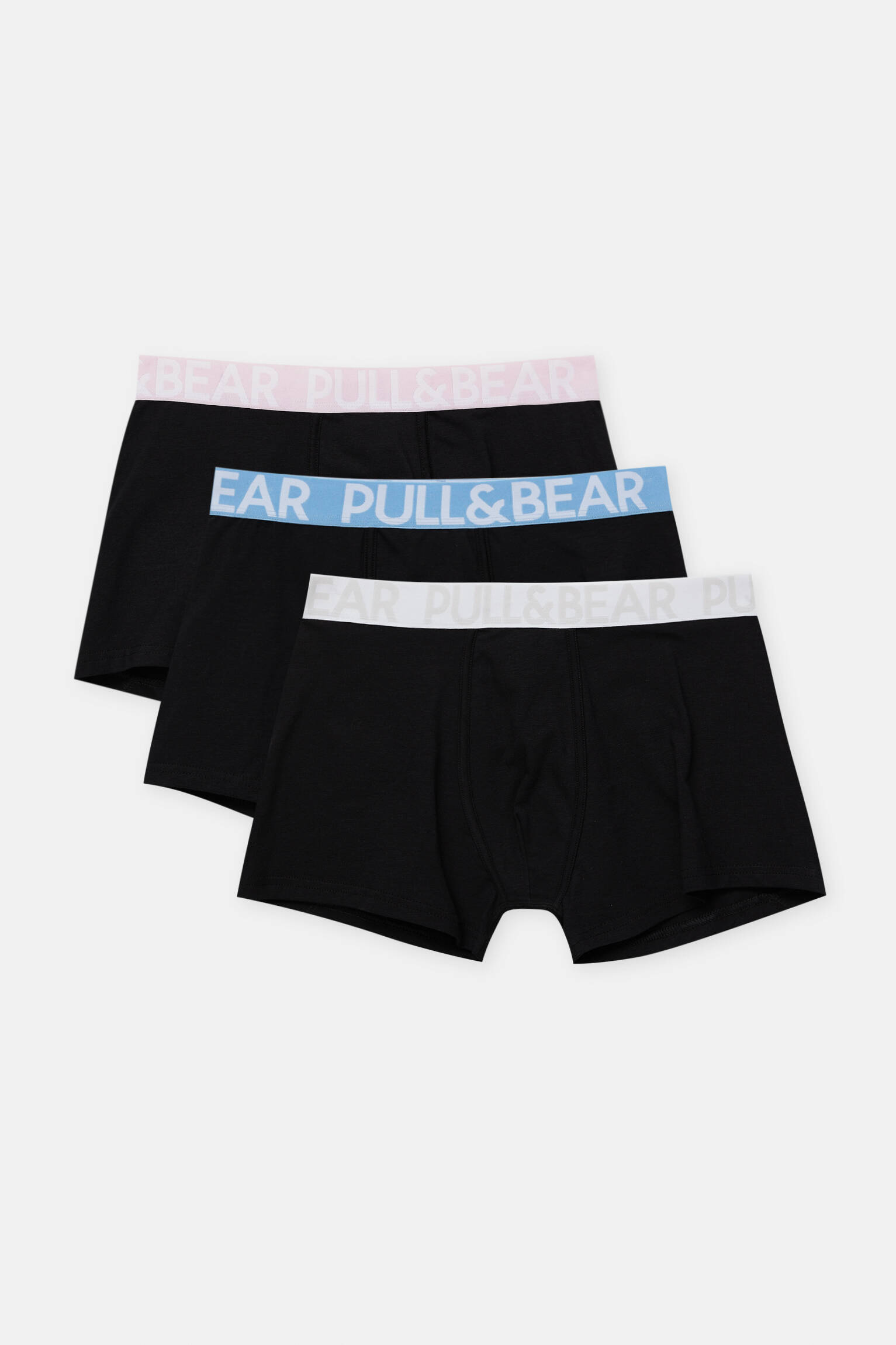 Pacote com 3 cuecas boxer de cintura alta em cores variadas.