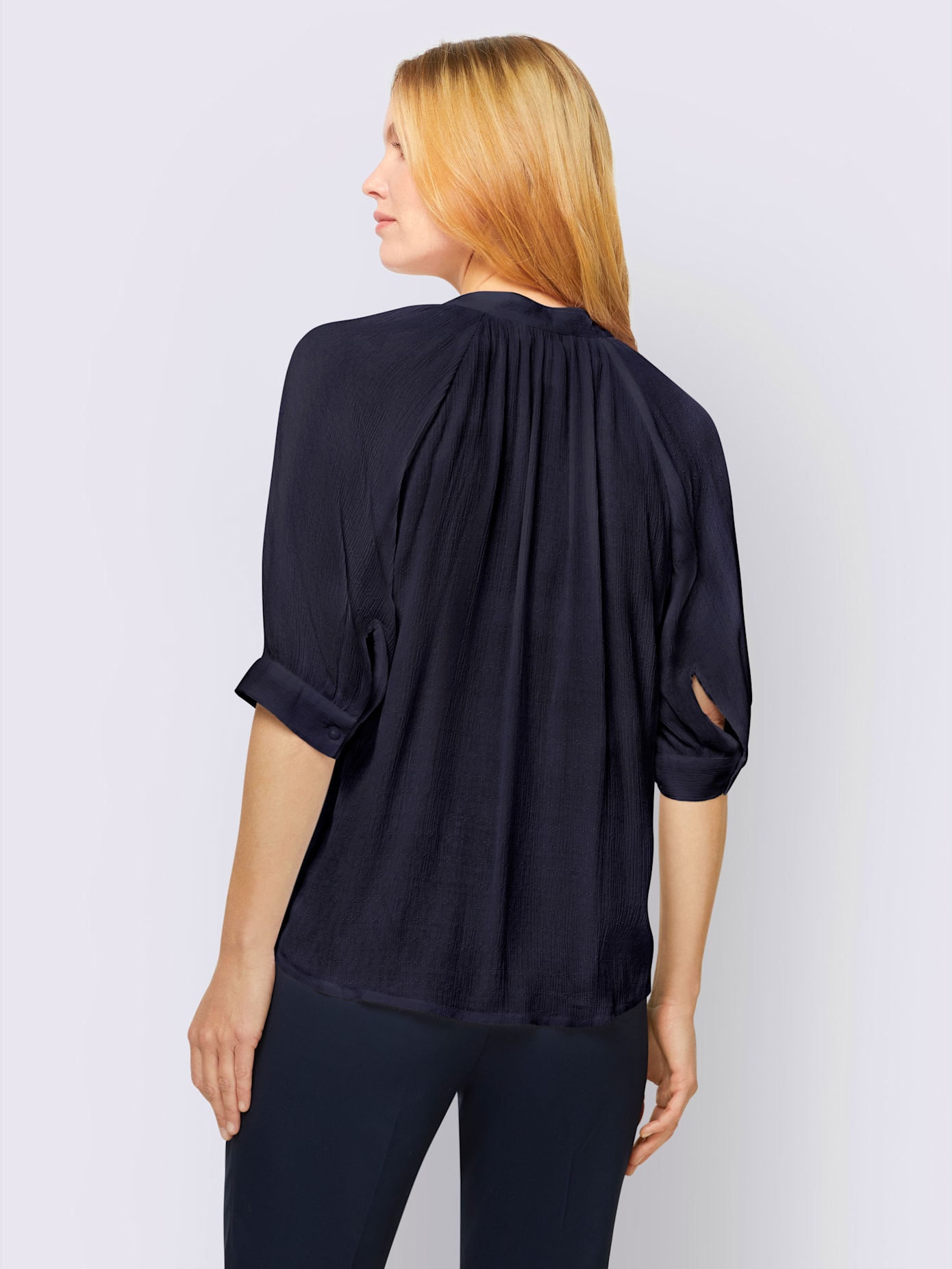 Chemisier look tendance avec ourlet arrondi