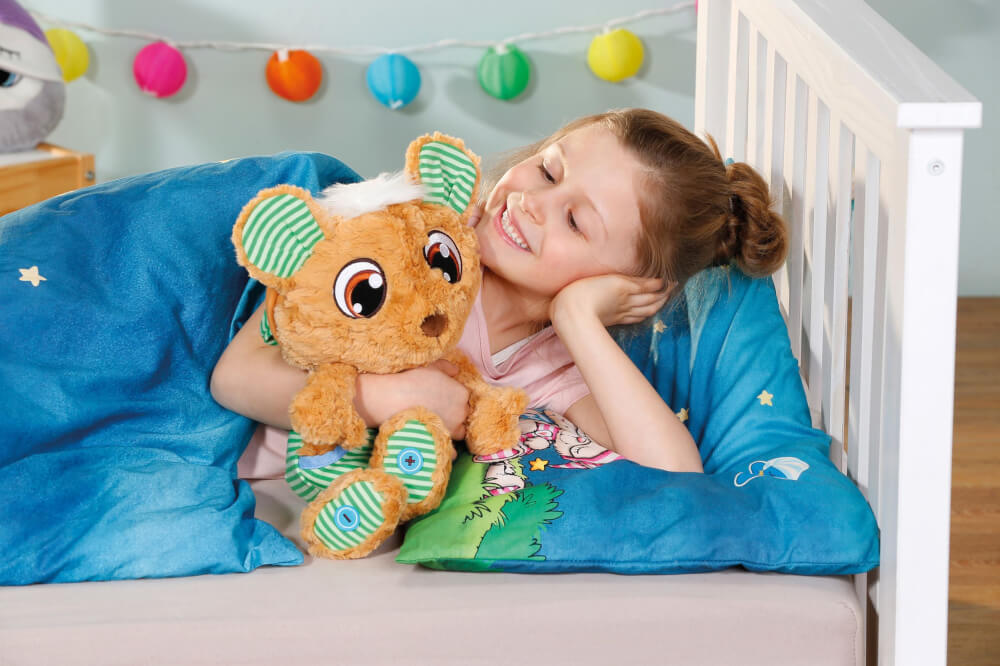 NICI Schlafmützen Schlummsi Schlummergeschichten-Bär in grünem Pyjama