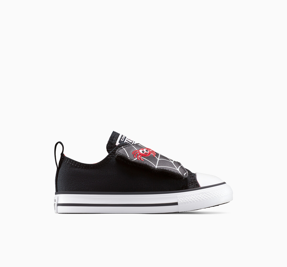 CONVERSE<br>Tênis com uma tira e estampa de teia de aranha