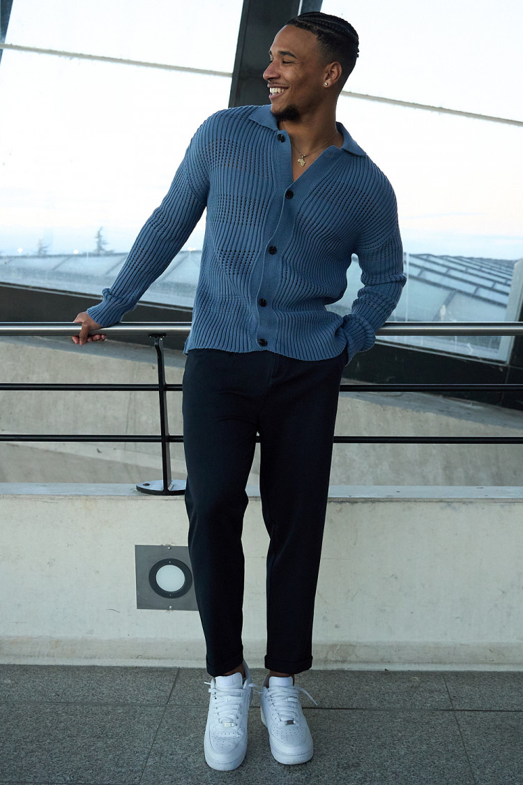 Gilet en maille ajourée bleu