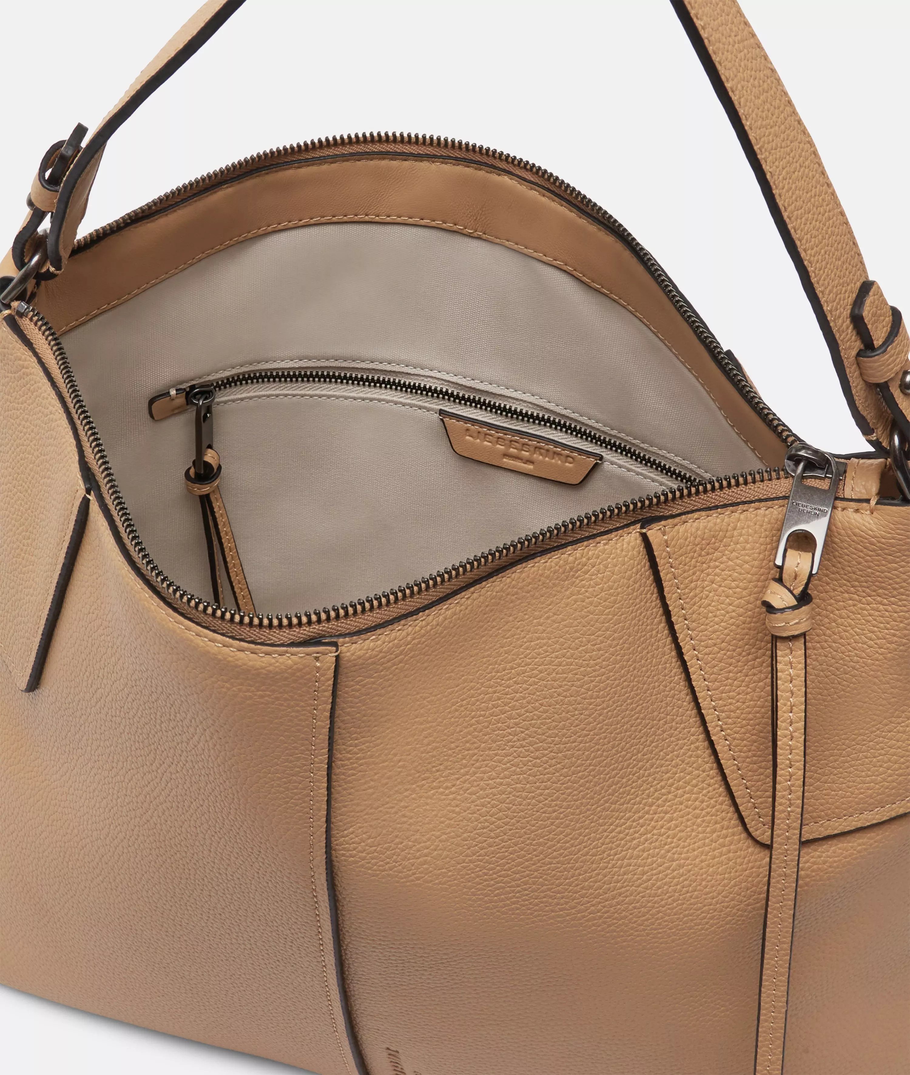 Mila Hobo M Spacious hobo bag made of cowhide leather