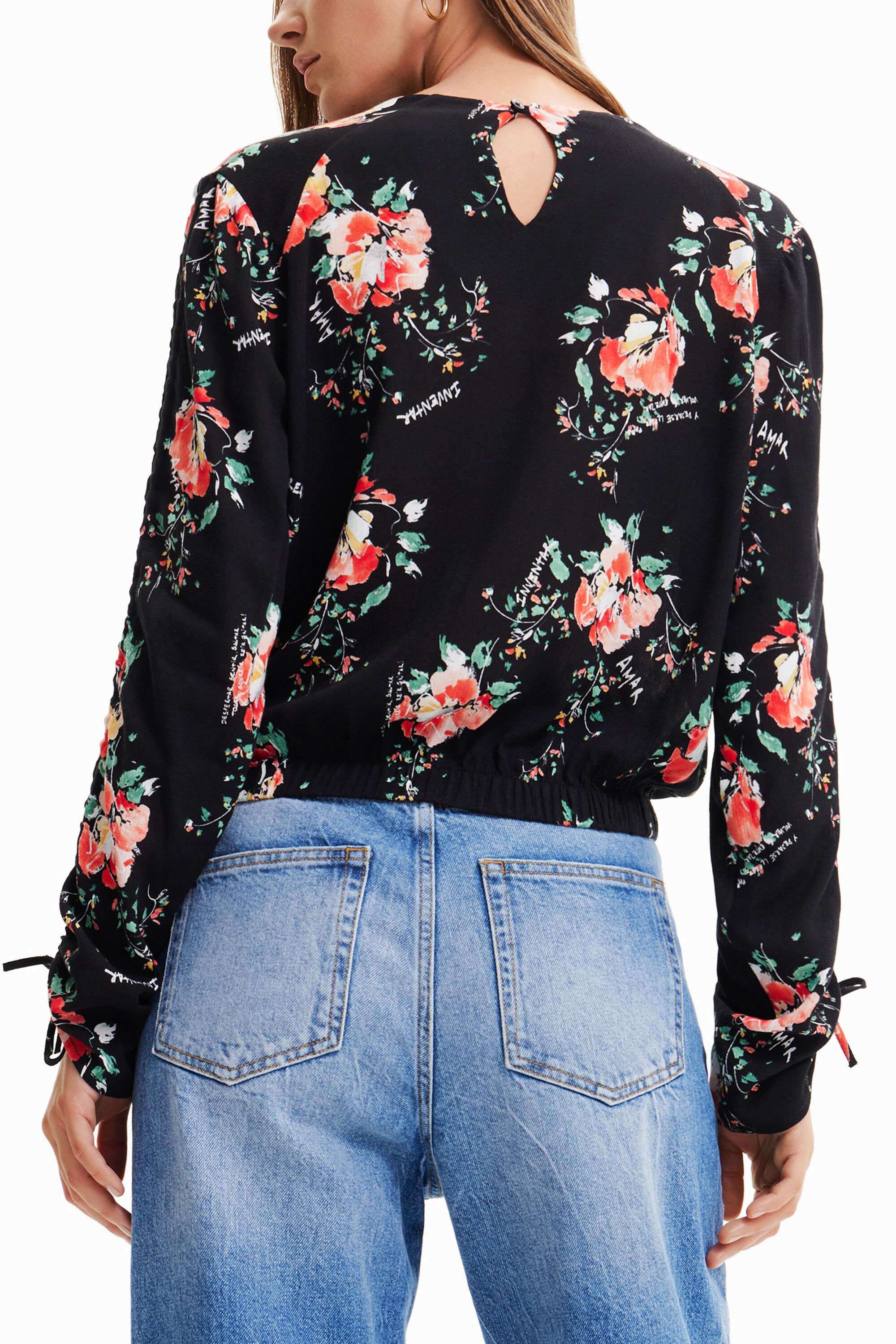 Blouse à manches réglables fleurie