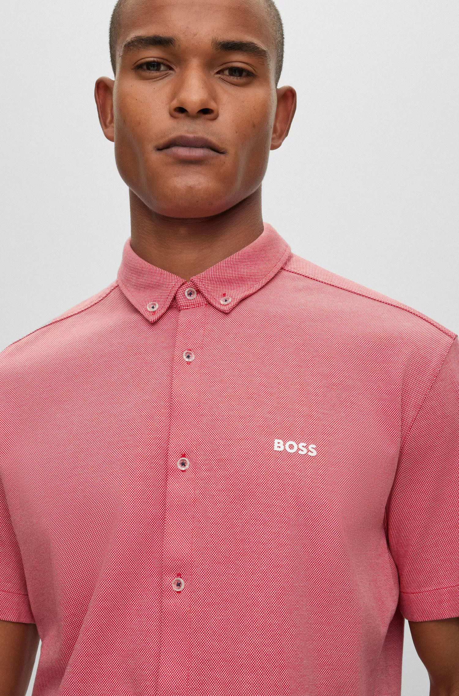 Camisa BOSS verde de botões, corte regular, em malha de algodão puro.