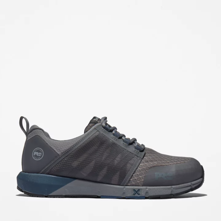 Sapato de trabalho masculino Radius com biqueira de liga metálica nas cores cinza e azul.