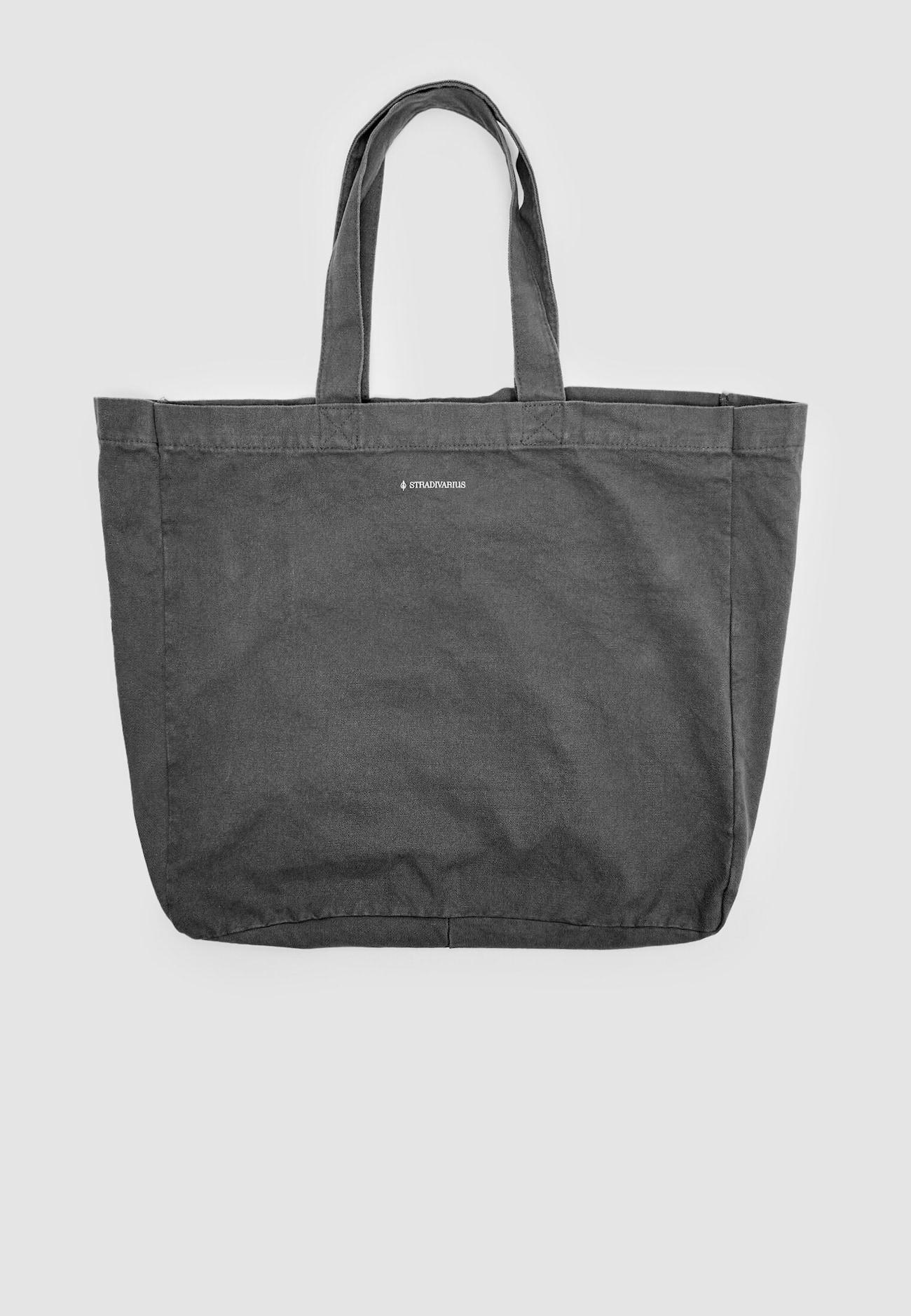Bolsa de tecido com efeito desbotado