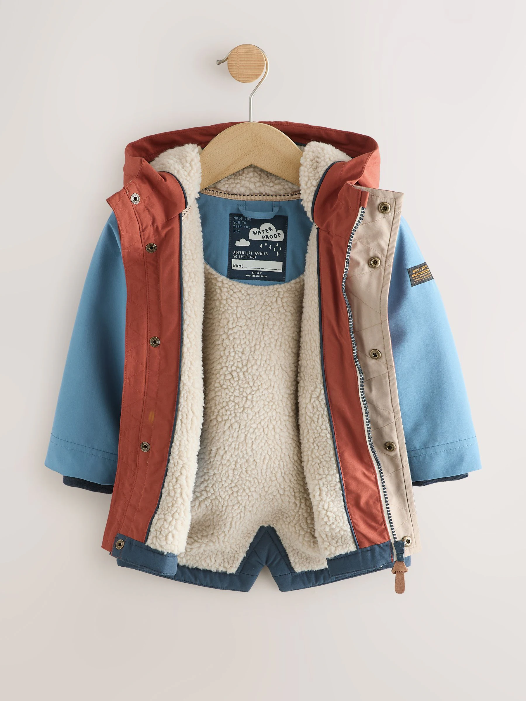 Marineblauw/rood met kleurvlakken - Waterdichte parka met borgvoering (3mnd -7jr)