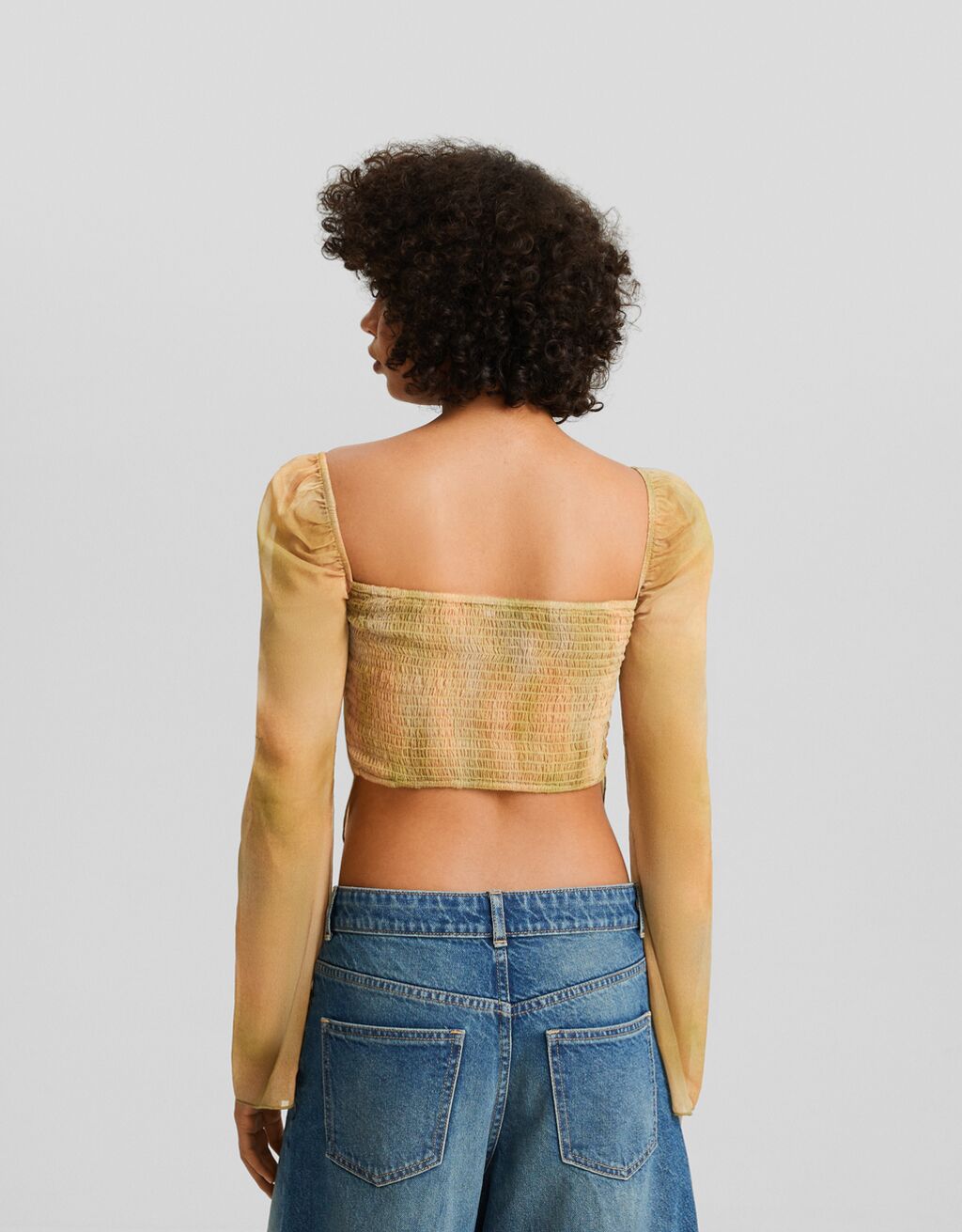 Blusa cropped de manga comprida com detalhe em chiffon