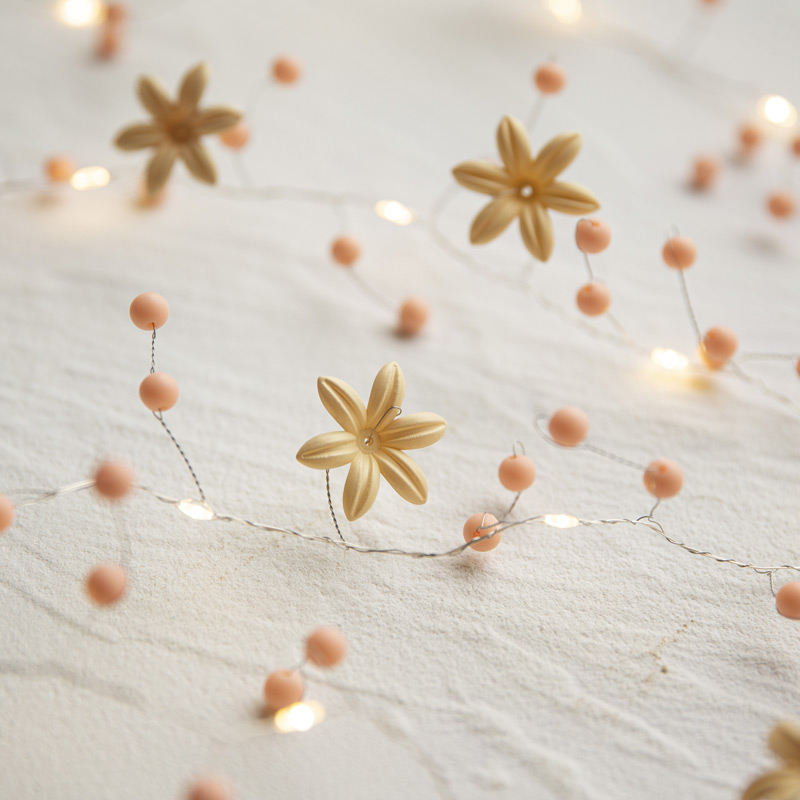 Guirlande lumineuse perles et fleurettes