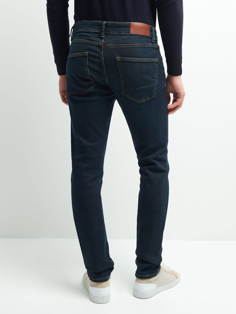 Jean regular en coton élasthane délavé