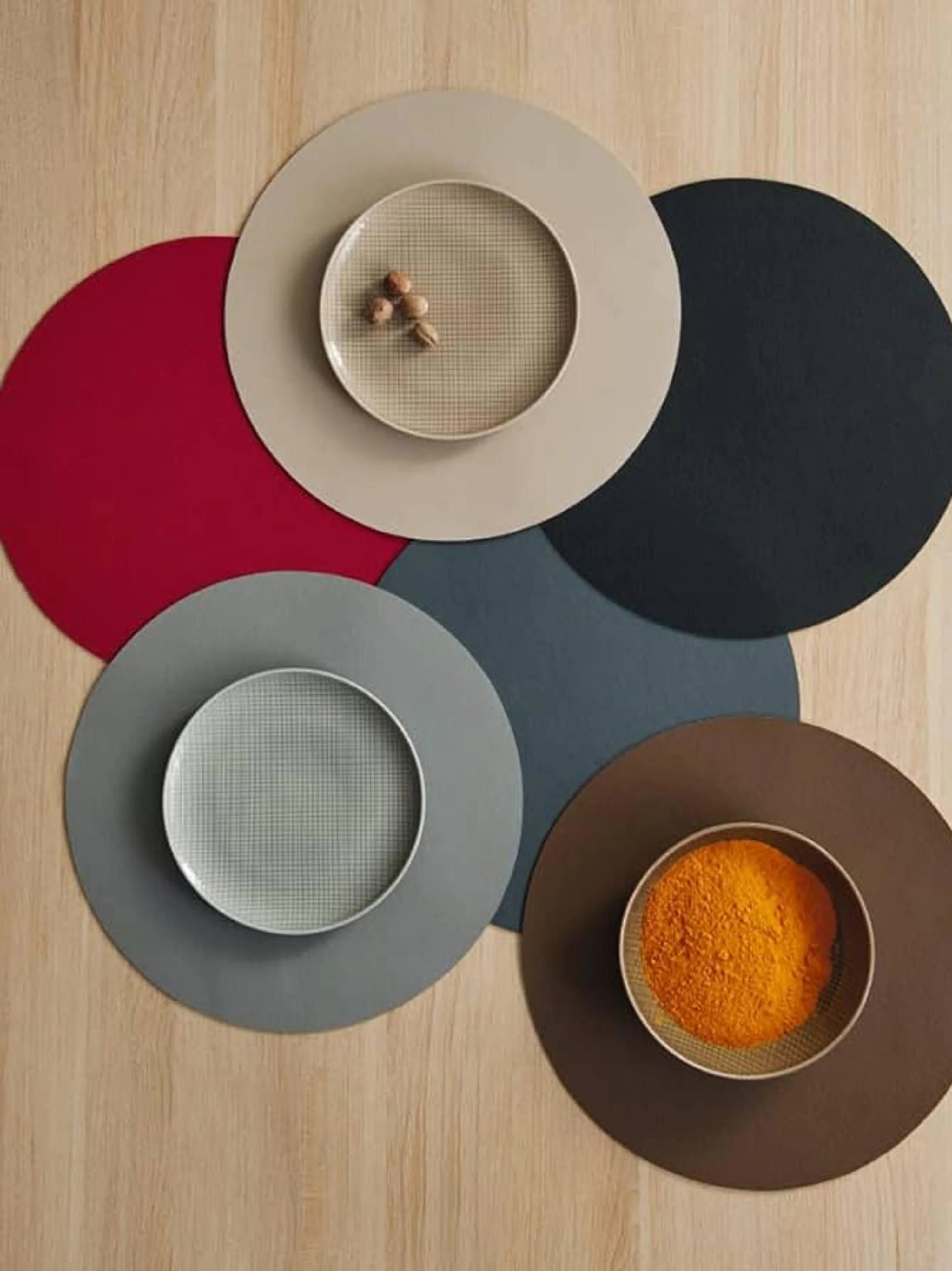 Ronde kunstleren placemats Pik, 2 stuks