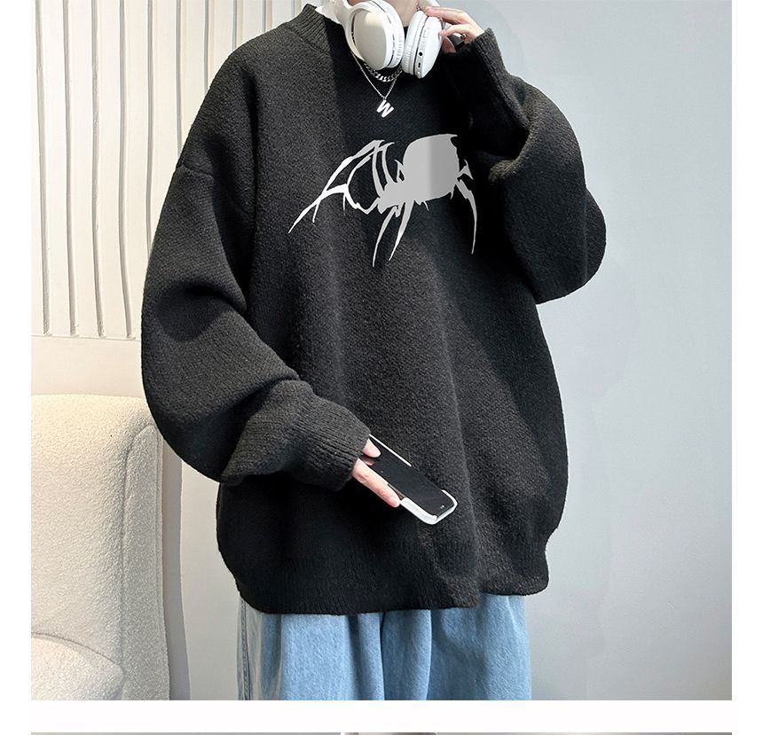 POSI - Oversized trui met ronde hals en spinnenprint