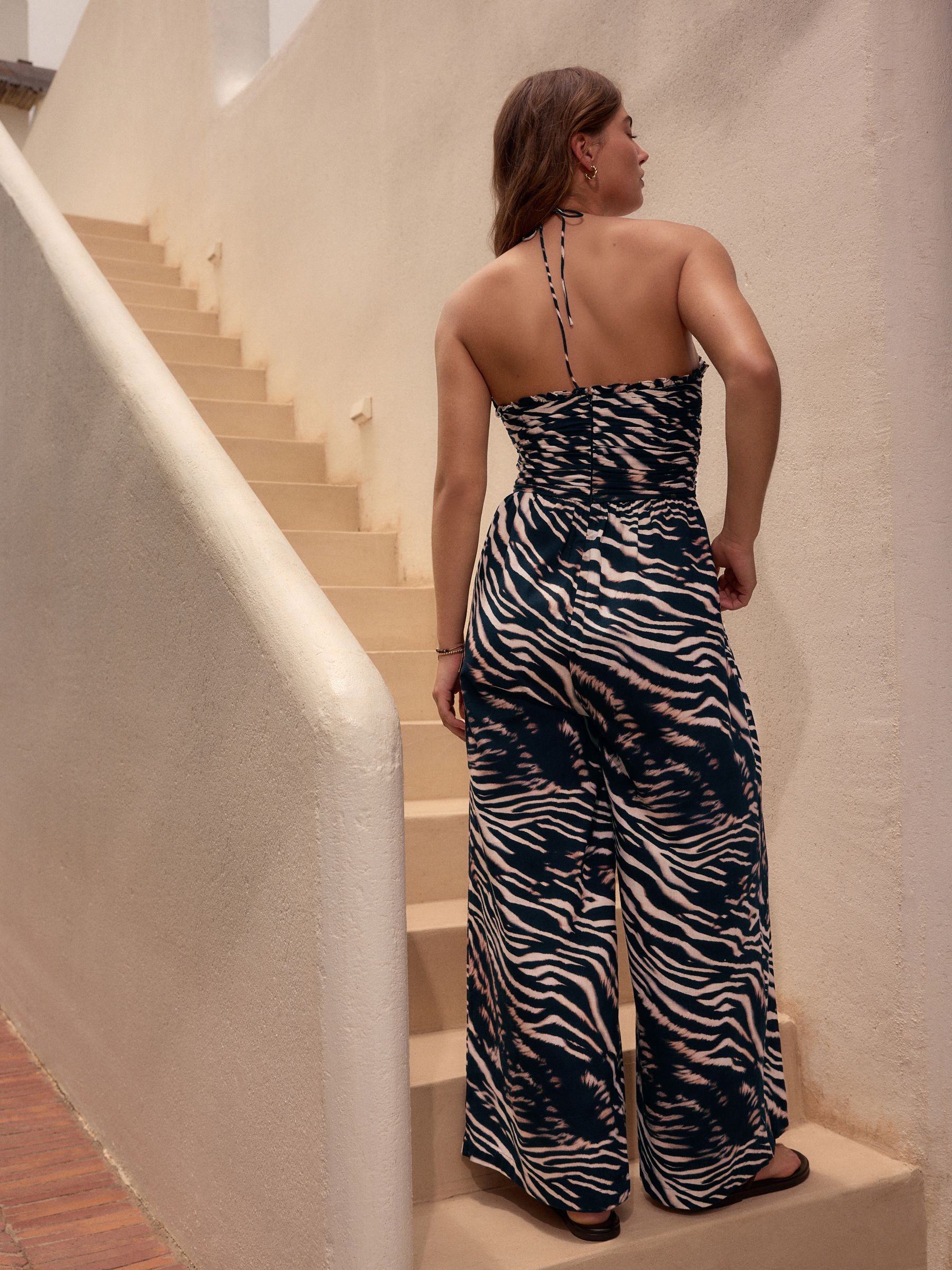 Zwart/dierenprint - Wijduitlopende jumpsuit met halternek van 100% katoen