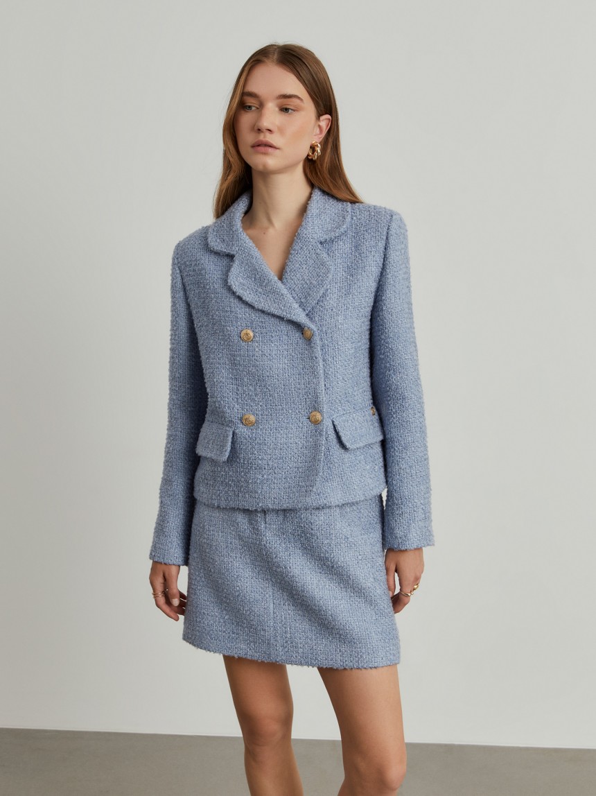 Casaco tweed cruzado com bolsos
