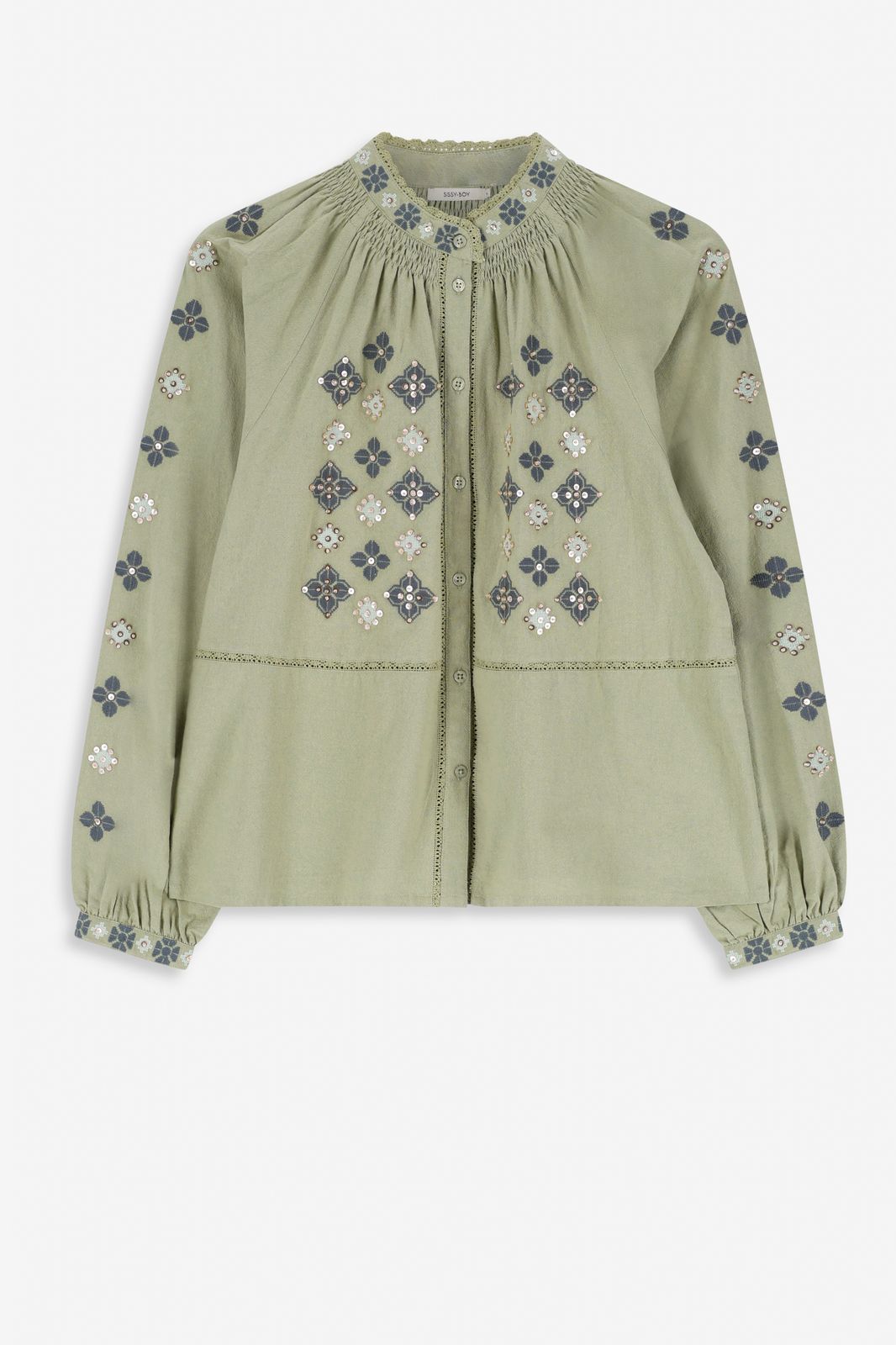 Lichtgroene blouse met borduurwerk