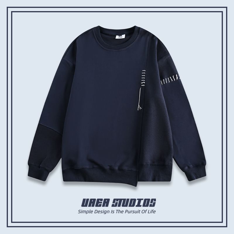 Chuoku - Asymmetrische sweatshirt met ronde hals en patchwork