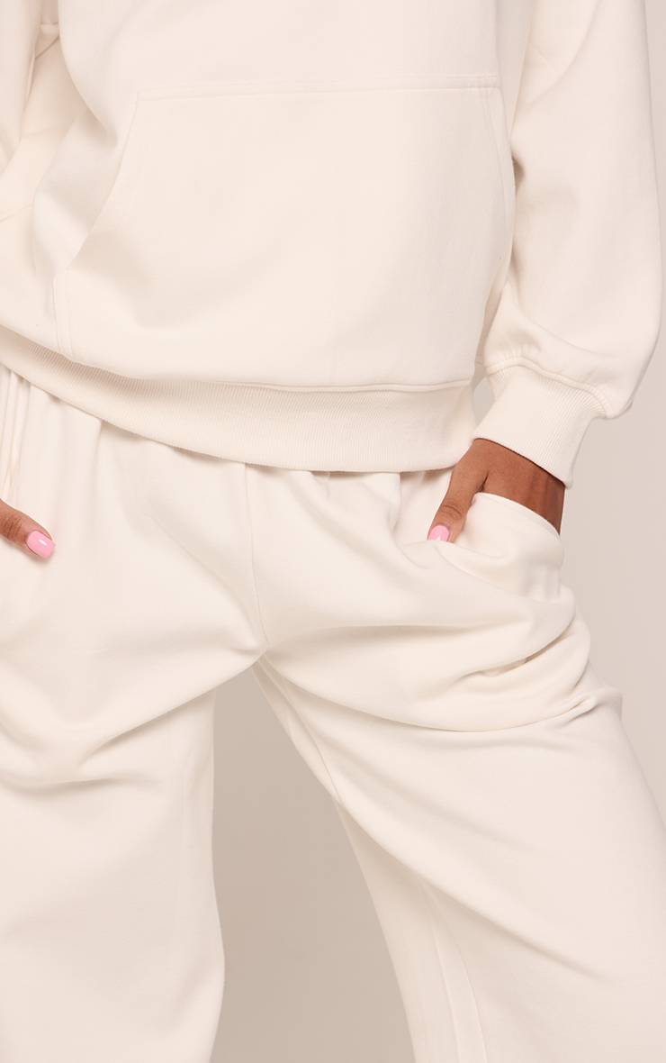 Crème Pantalon De Jogging Large En Jersey Interlock