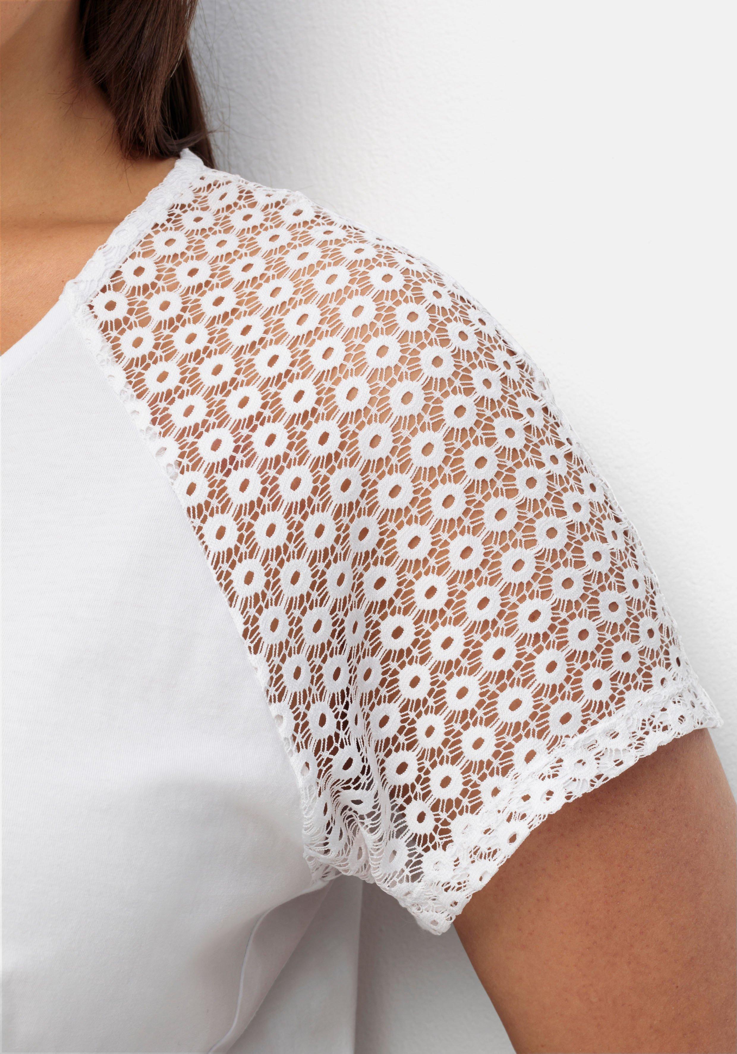 Shirt mit Zipper am Ausschnitt und Ärmeln aus Spitze