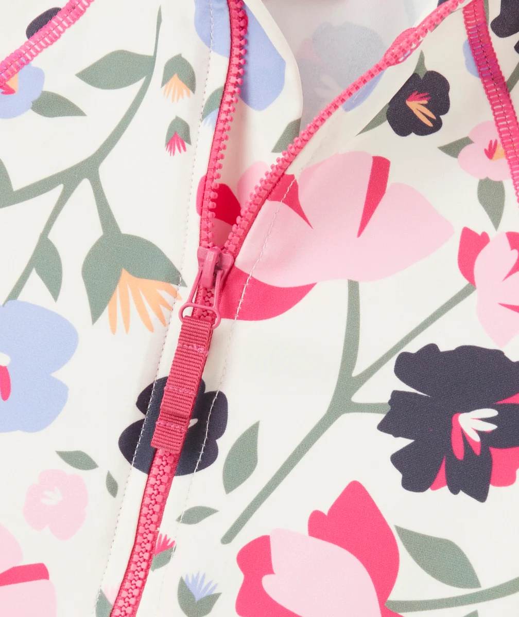 COMBINAISON ANTI-UV ZIPPÉ FILLE EN FIBRES RECYCLÉES ET IMPRIMÉ FLEURI