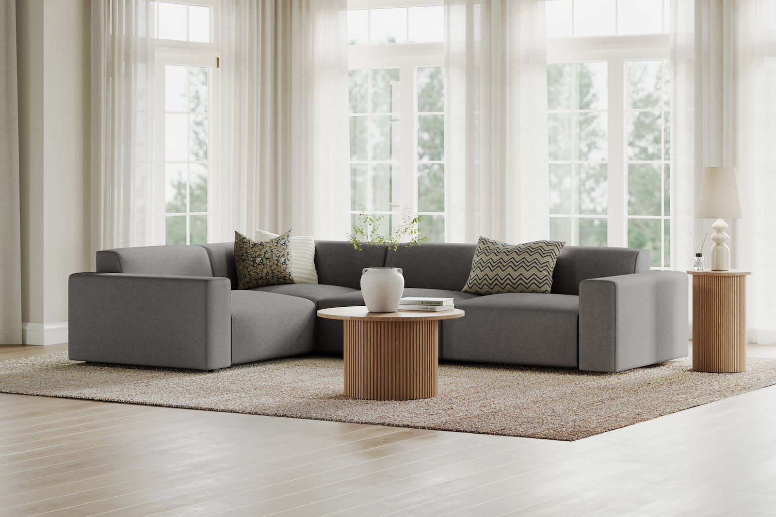 Styl hjørnesofa 1,5/3 hjørnesofa duo puter. Tekstil Lombardo 3/3 Warm Grey med sorte ben.