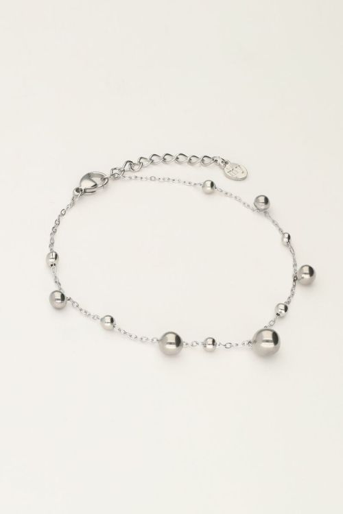 Armband met bolletjes bedels