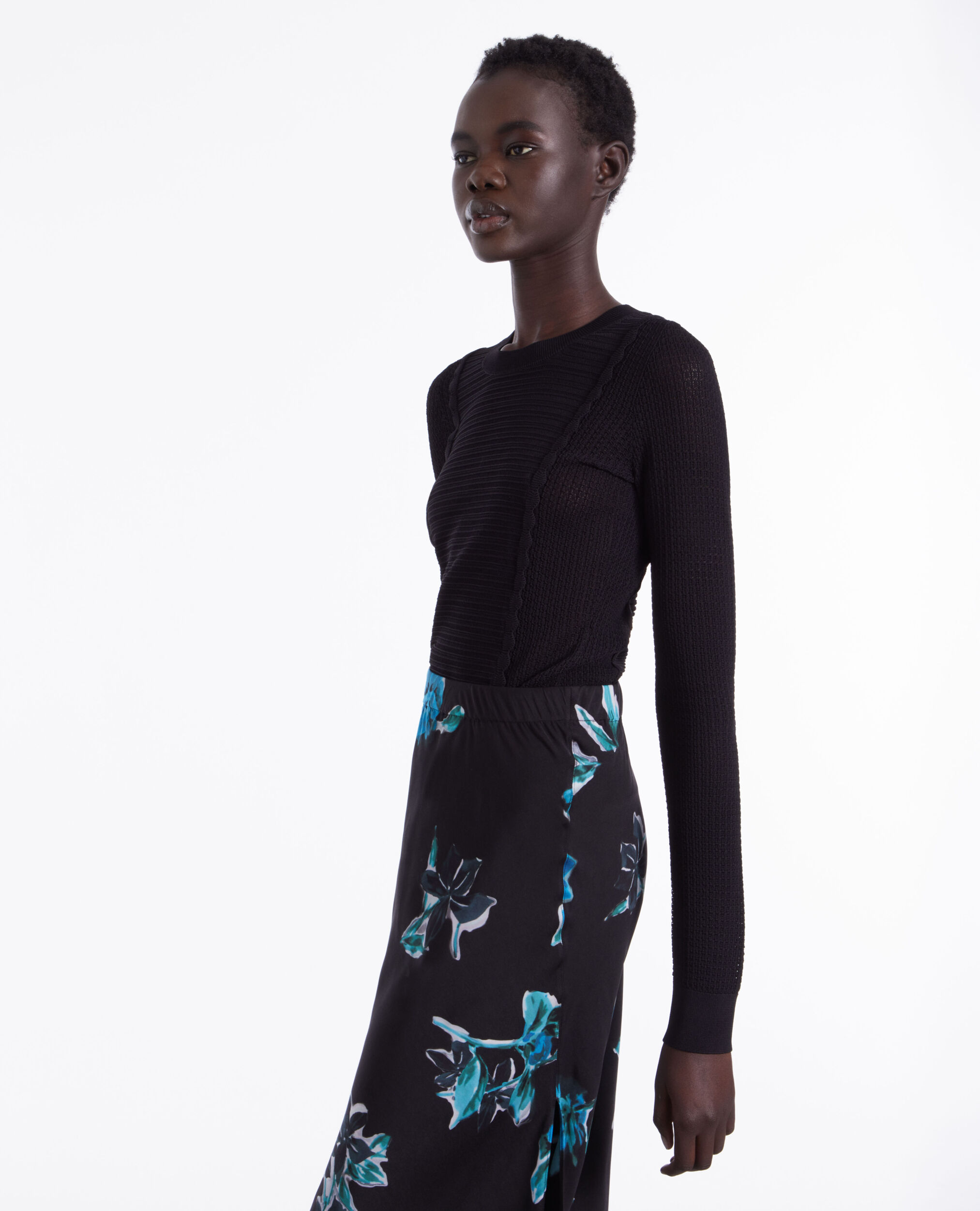 Pull noir en maille ajourée
