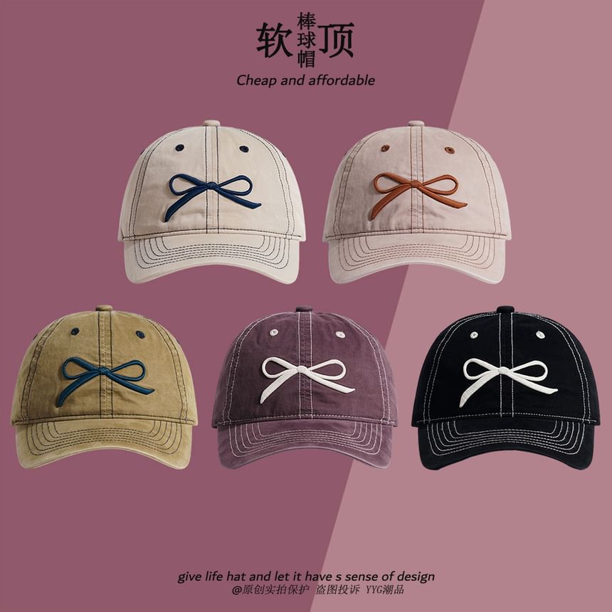 Alpha Kiss - Baseballpet met strikborduursel en contraststiksel