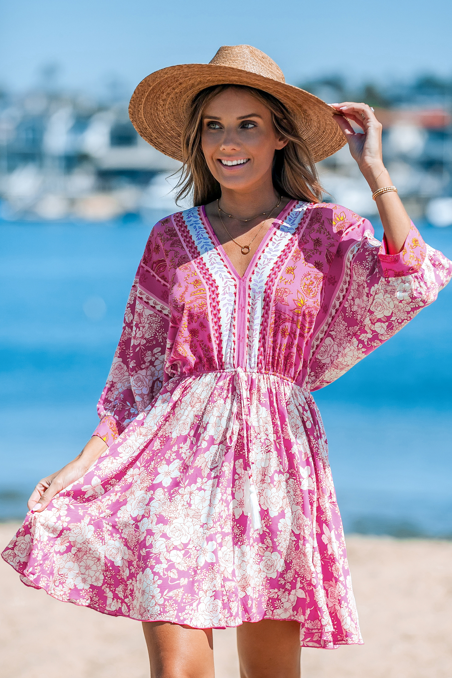 Robe mini à pompons et imprimé floral