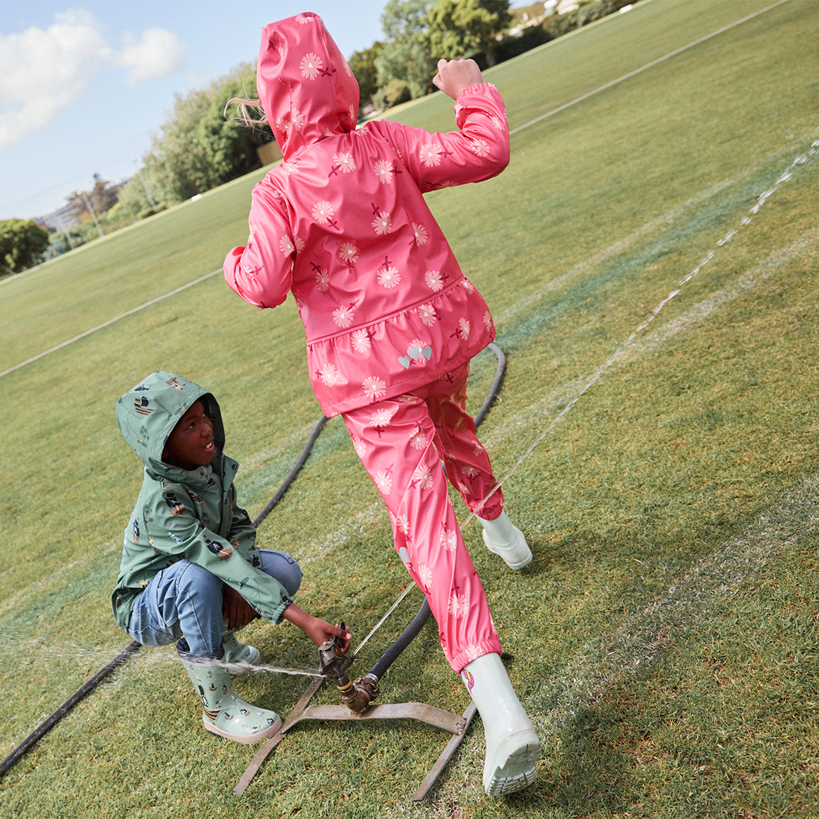 Topolino Mädchen Regenhose mit Blumen-Allover pink