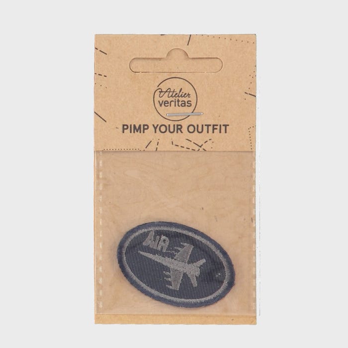 Atelier Veritas-Ovale patch met vliegtuig 2x4cm