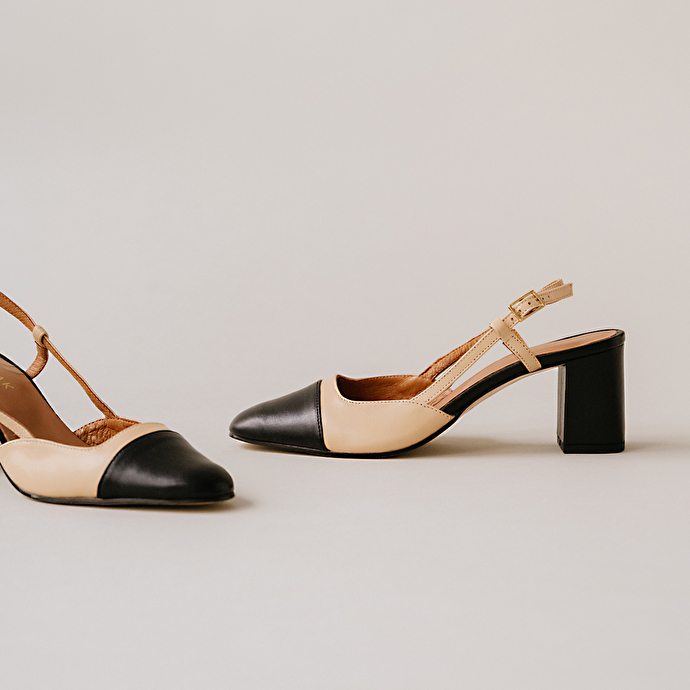 Babies à talons  en cuir noir et beige