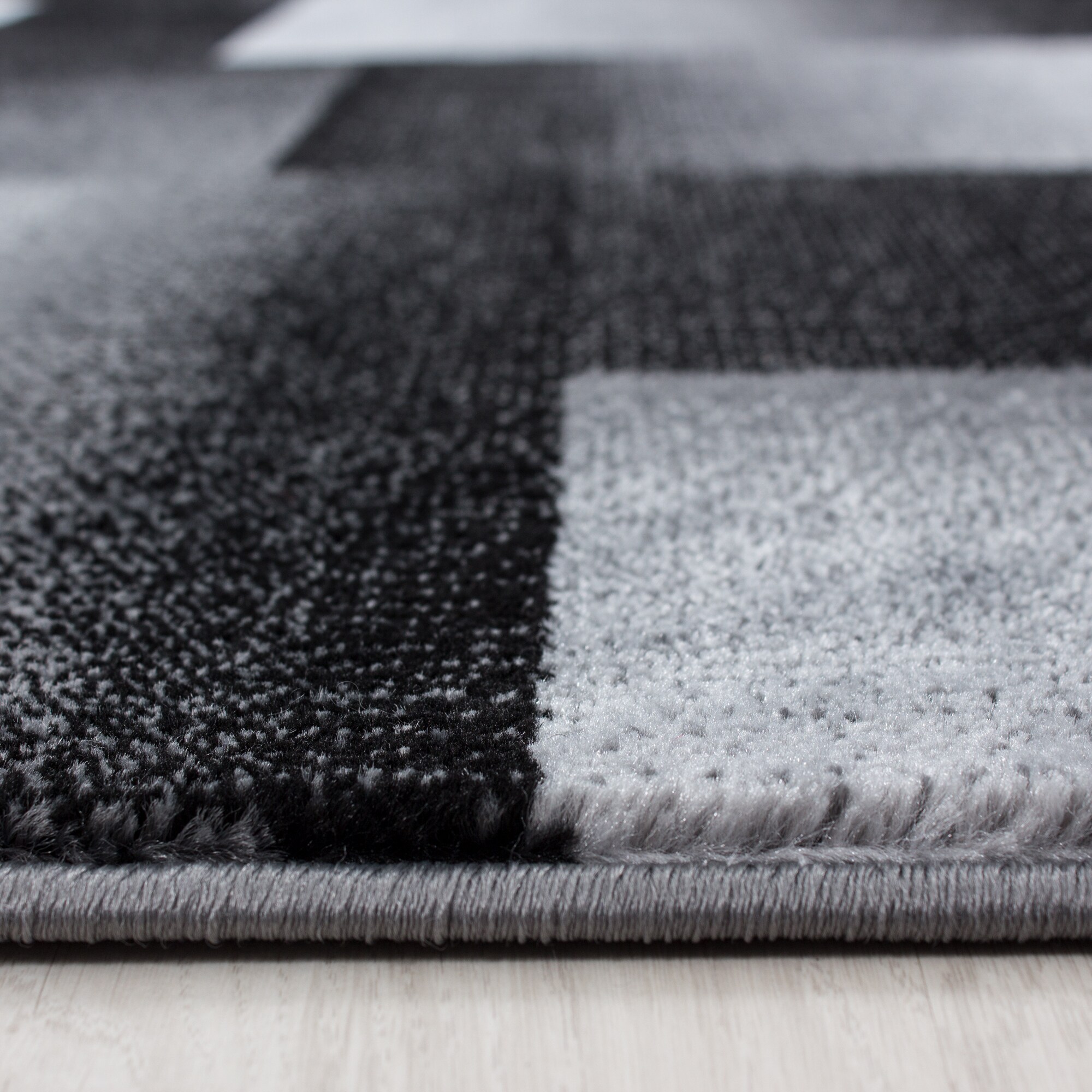 Teppich modern Designer Wohnzimmer Abstrakt Kariert Muster Schwarz Grau Weiß