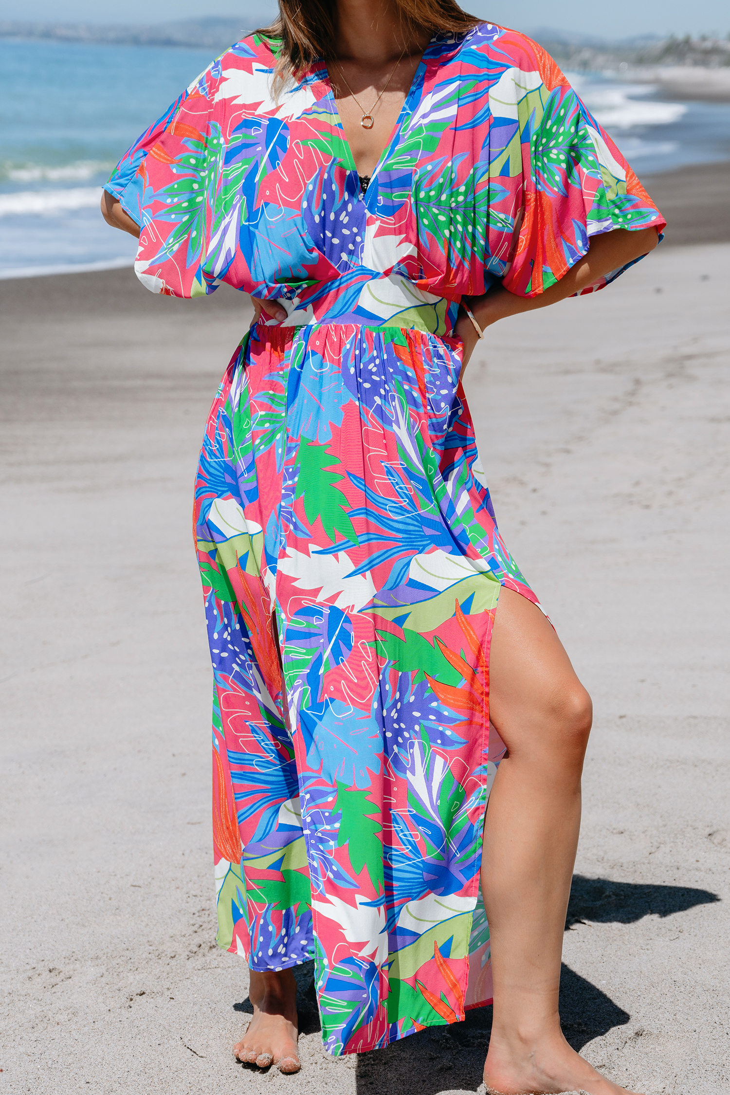 Robe maxi à smocks tropicale brillante
