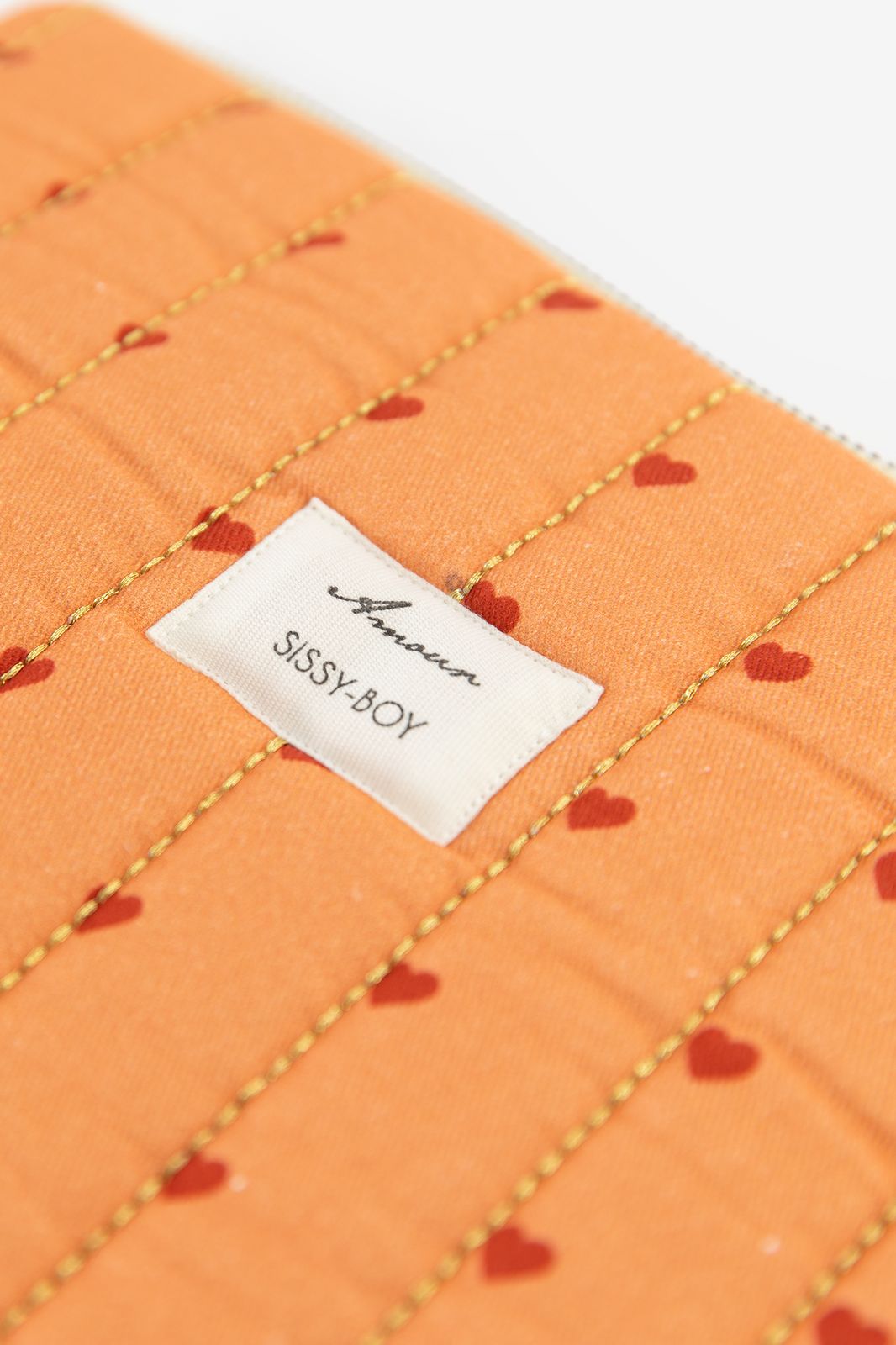 Oranje laptophoes met hartjes