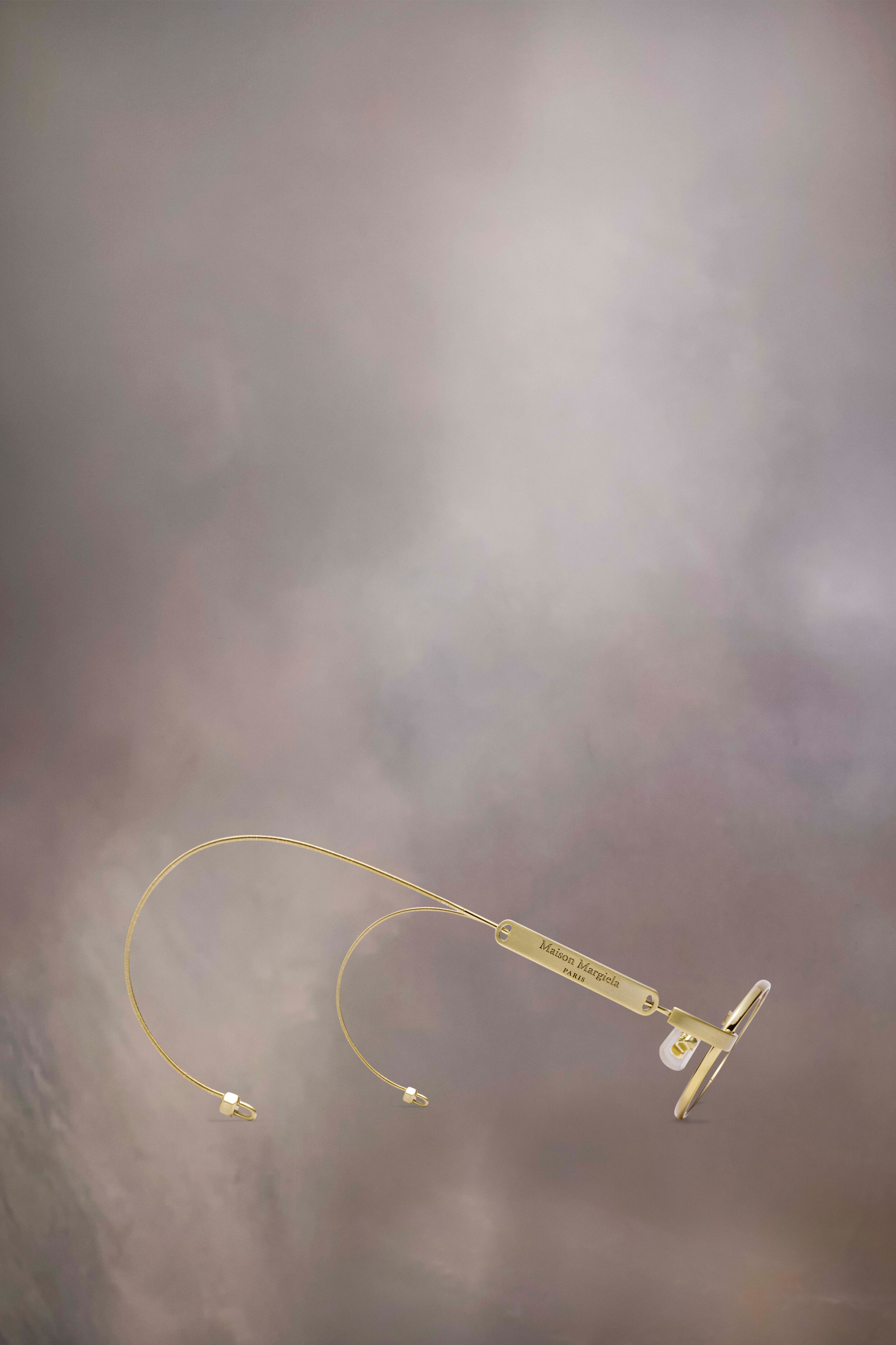 Lunettes ovales dorées x Gentle Monster​