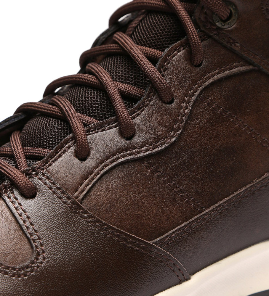 Botas Skechers Delson de couro marrom