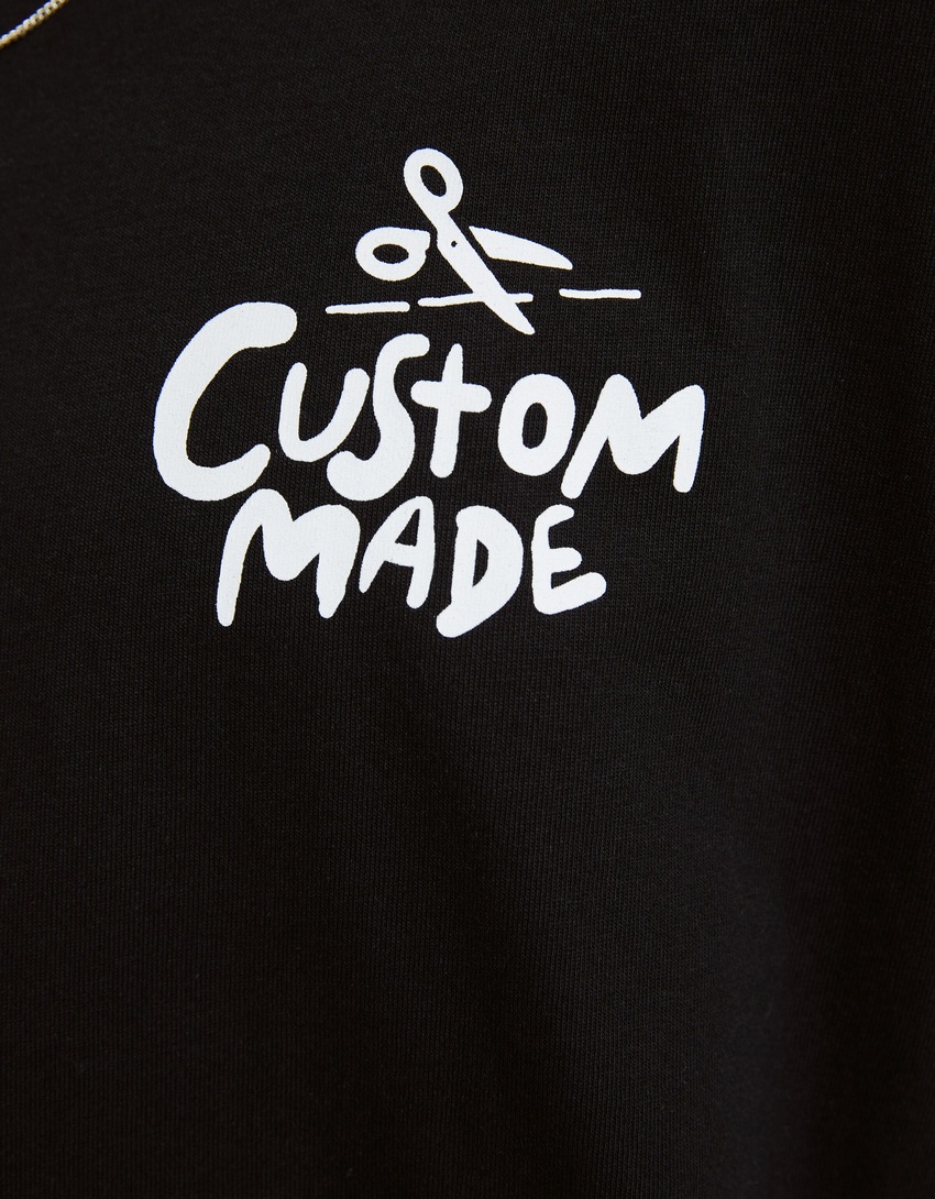 Camiseta de manga curta extra folgada com estampa.