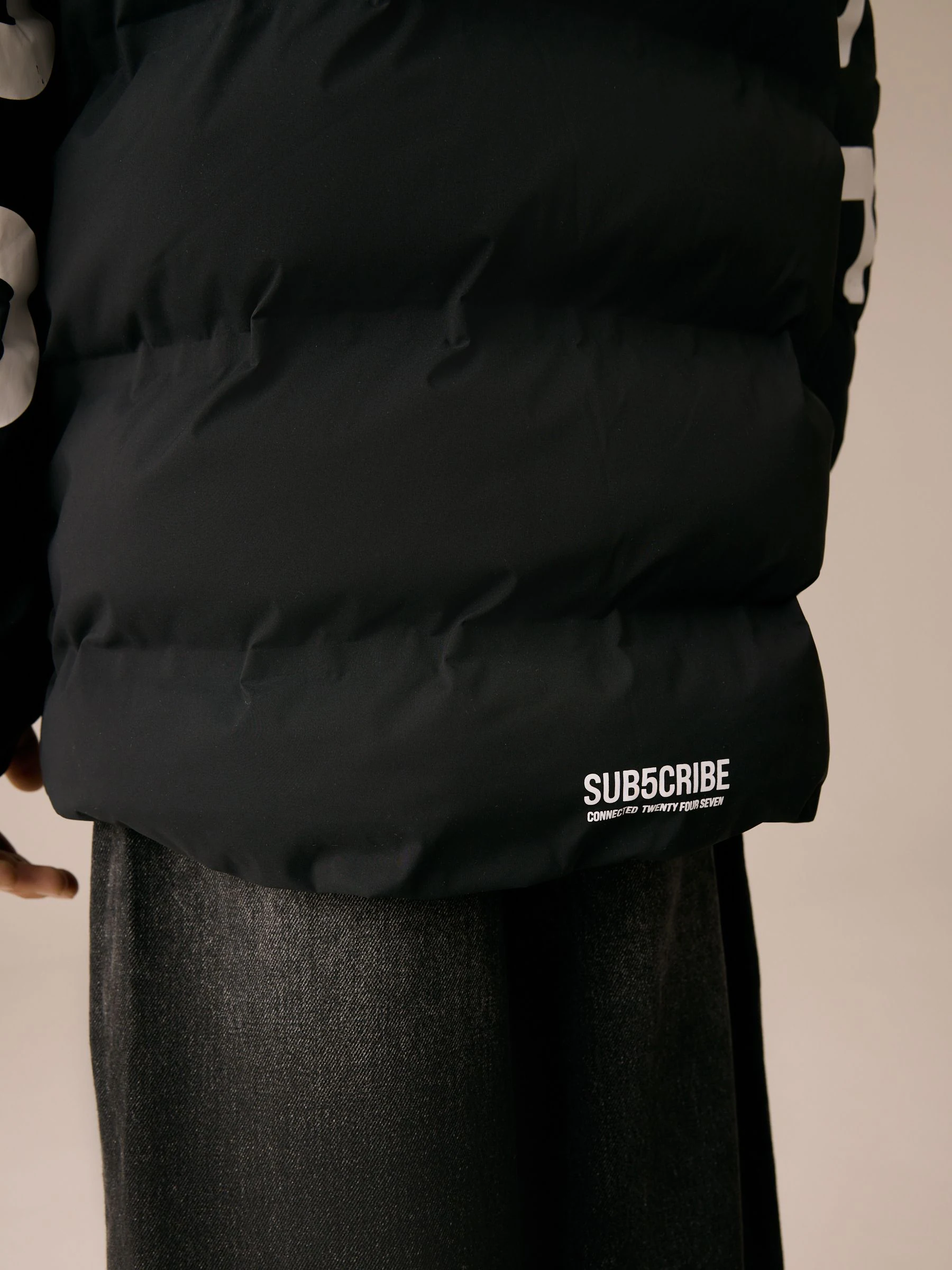 Zwart/wit - Regenbestendige gewatteerde jas met microfleece voering (3-17jr)