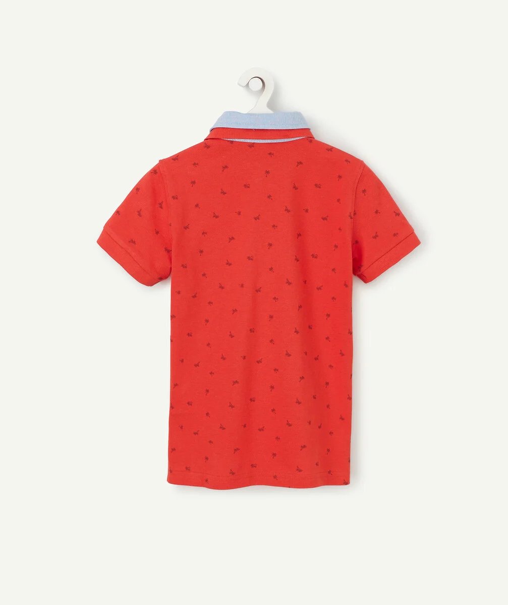 LE POLO ROUGE DOUBLE COL AVEC ANIMATION PALMIERS