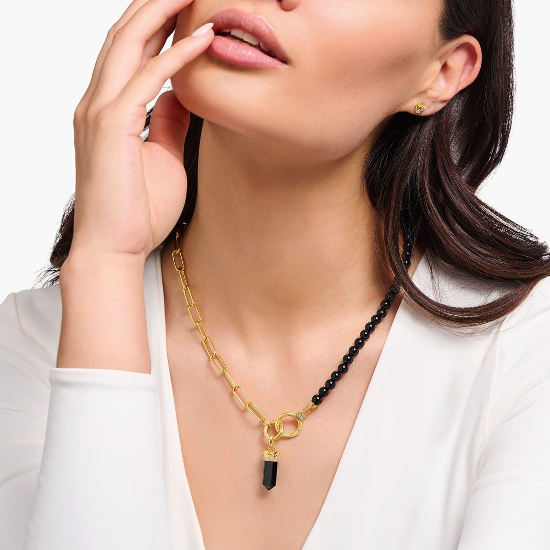 Thomas Sabo Cosmic Amulet Anhänger mit facettiertem Onyx vergoldet