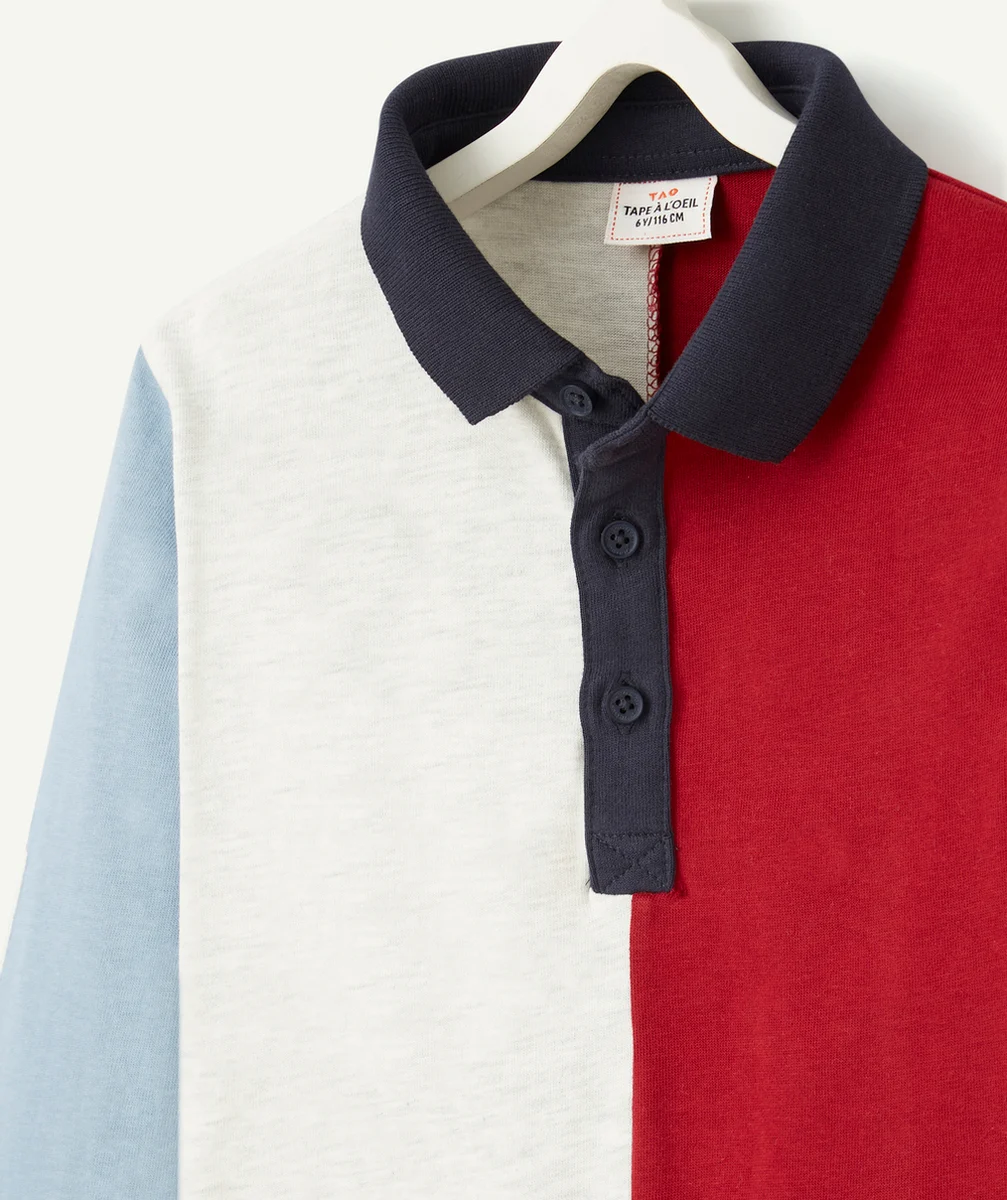 POLO GARÇON EN COTON BIOLOGIQUE COLORBLOCK AVEC MESSAGE
